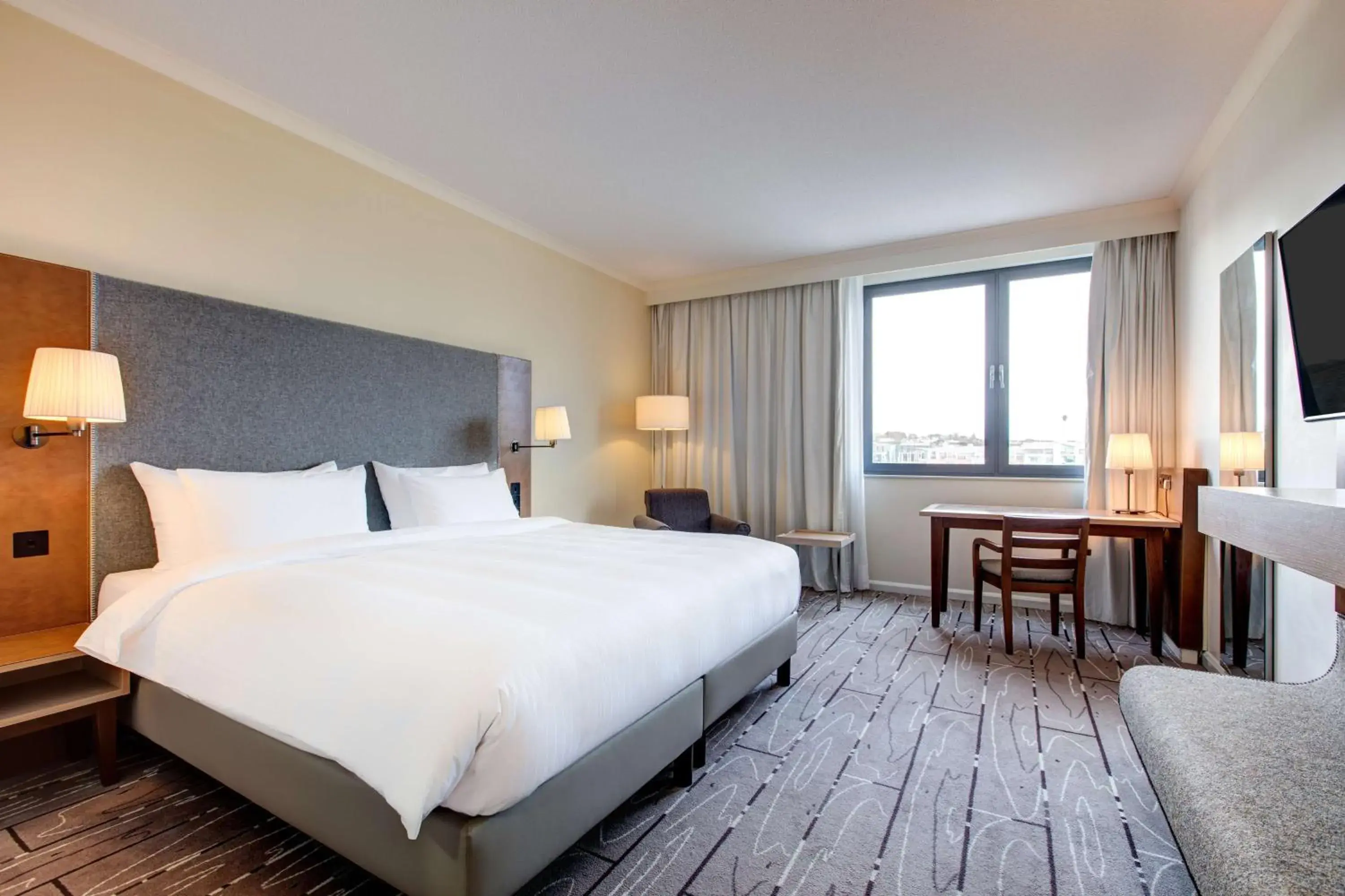 Photo of the whole room, Bed in Radisson Blu Waterfront Hotel, Jersey Photo of the whole room, Bed in Radisson Blu Waterfront Hotel, Jersey