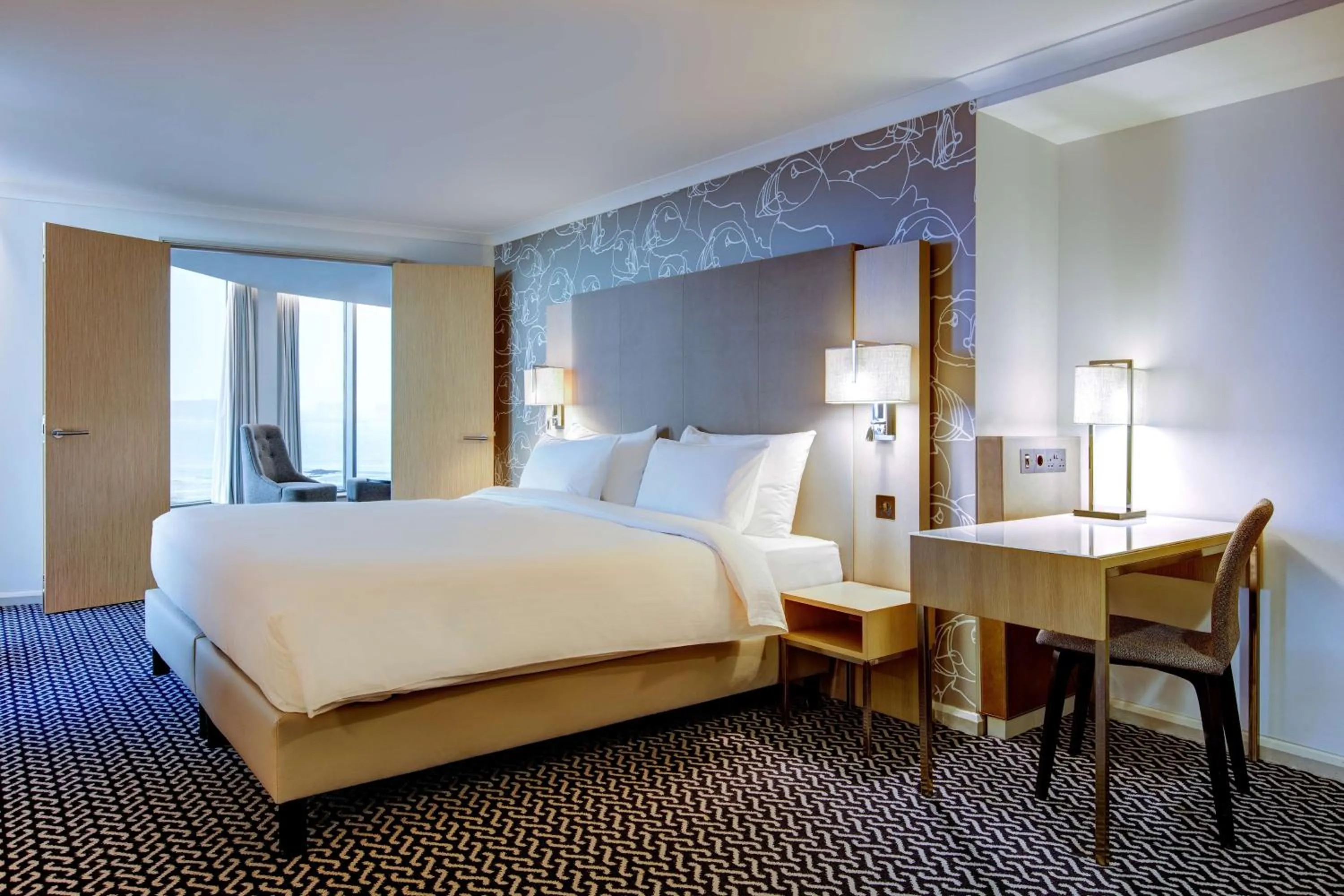 Photo of the whole room, Bed in Radisson Blu Waterfront Hotel, Jersey