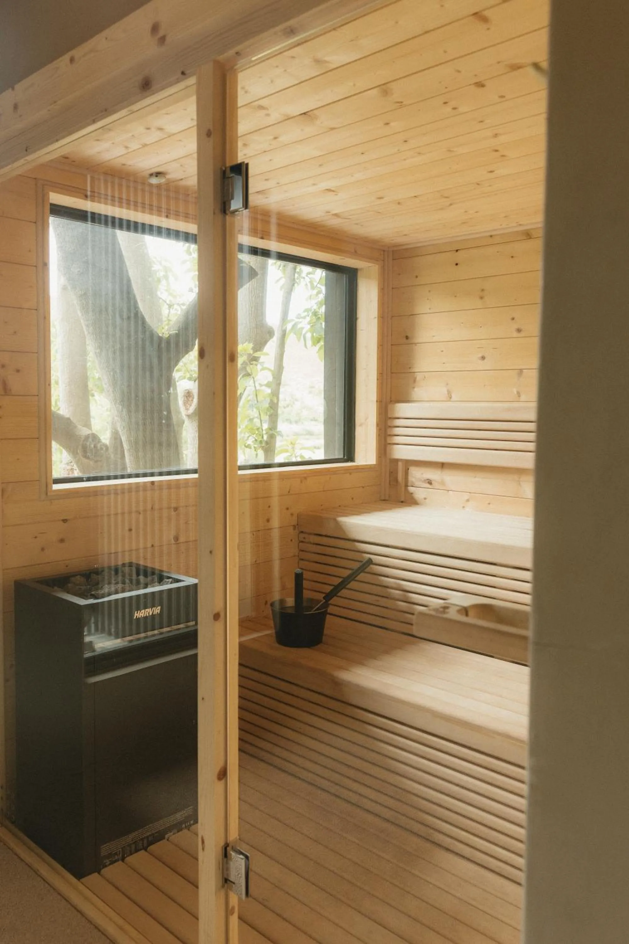 Bed in Botlierskop Tented Lodge