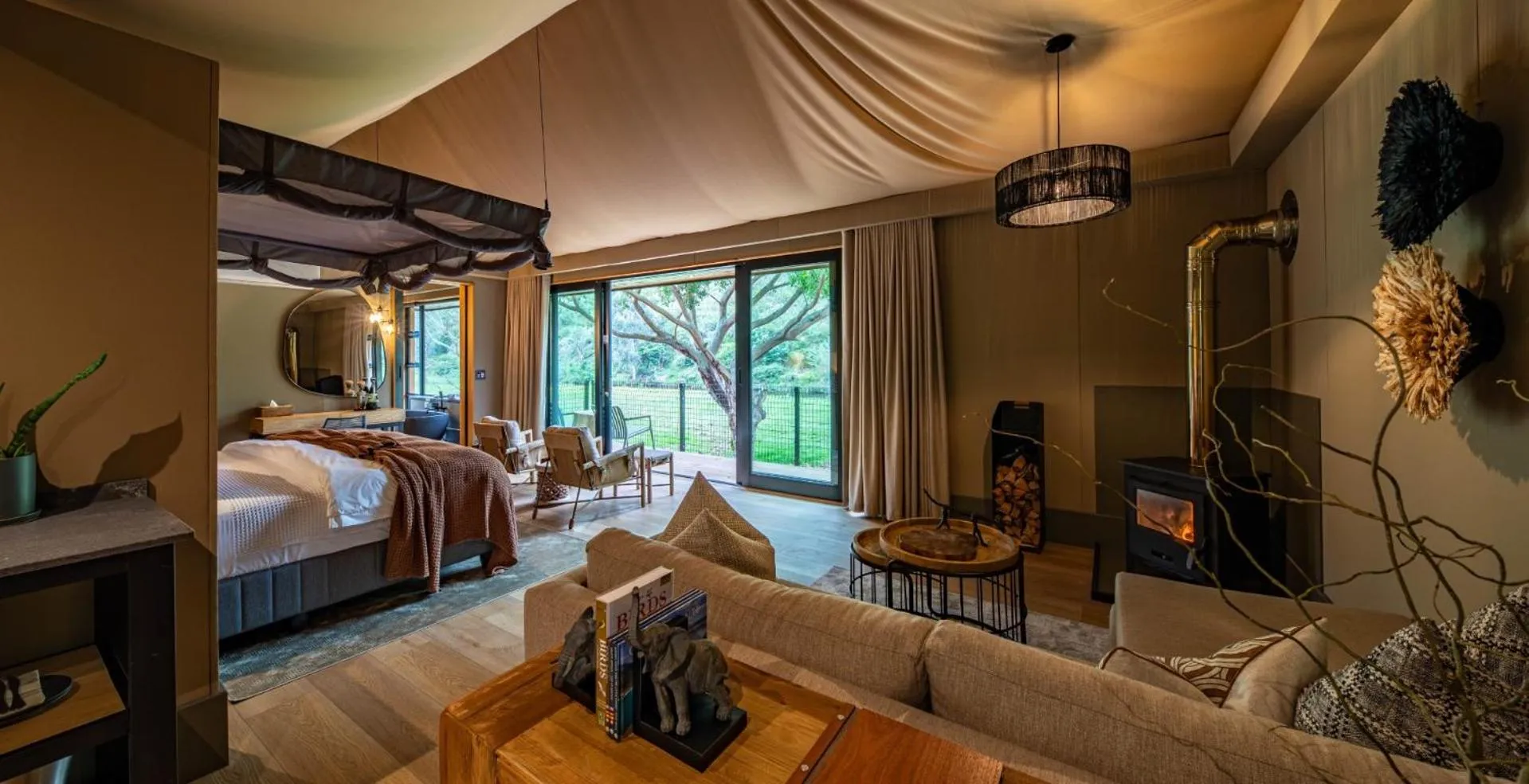 Bed in Botlierskop Tented Lodge