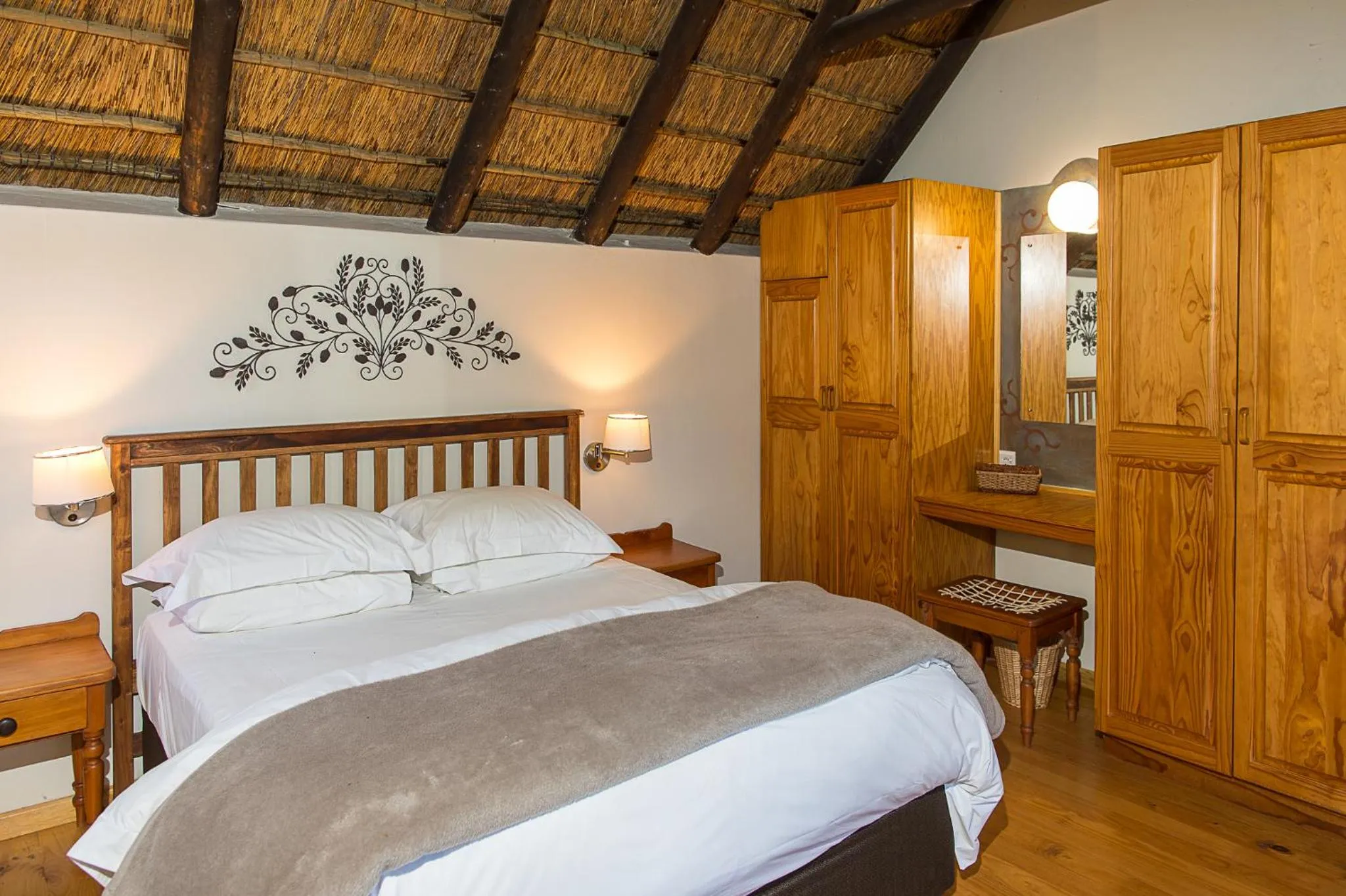 Photo of the whole room, Bed in Coral Tree Cottages