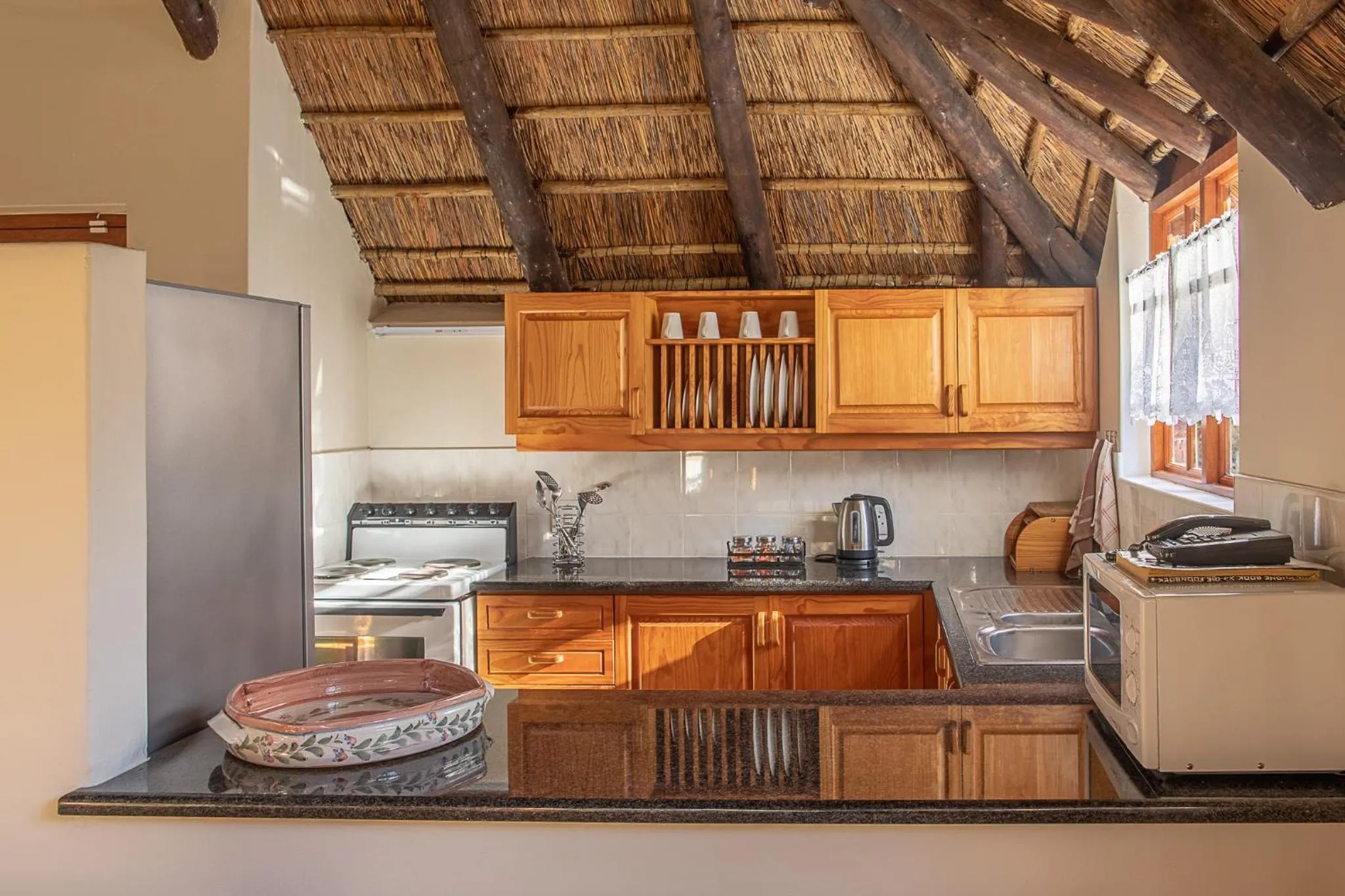 Kitchen or kitchenette in Coral Tree Cottages