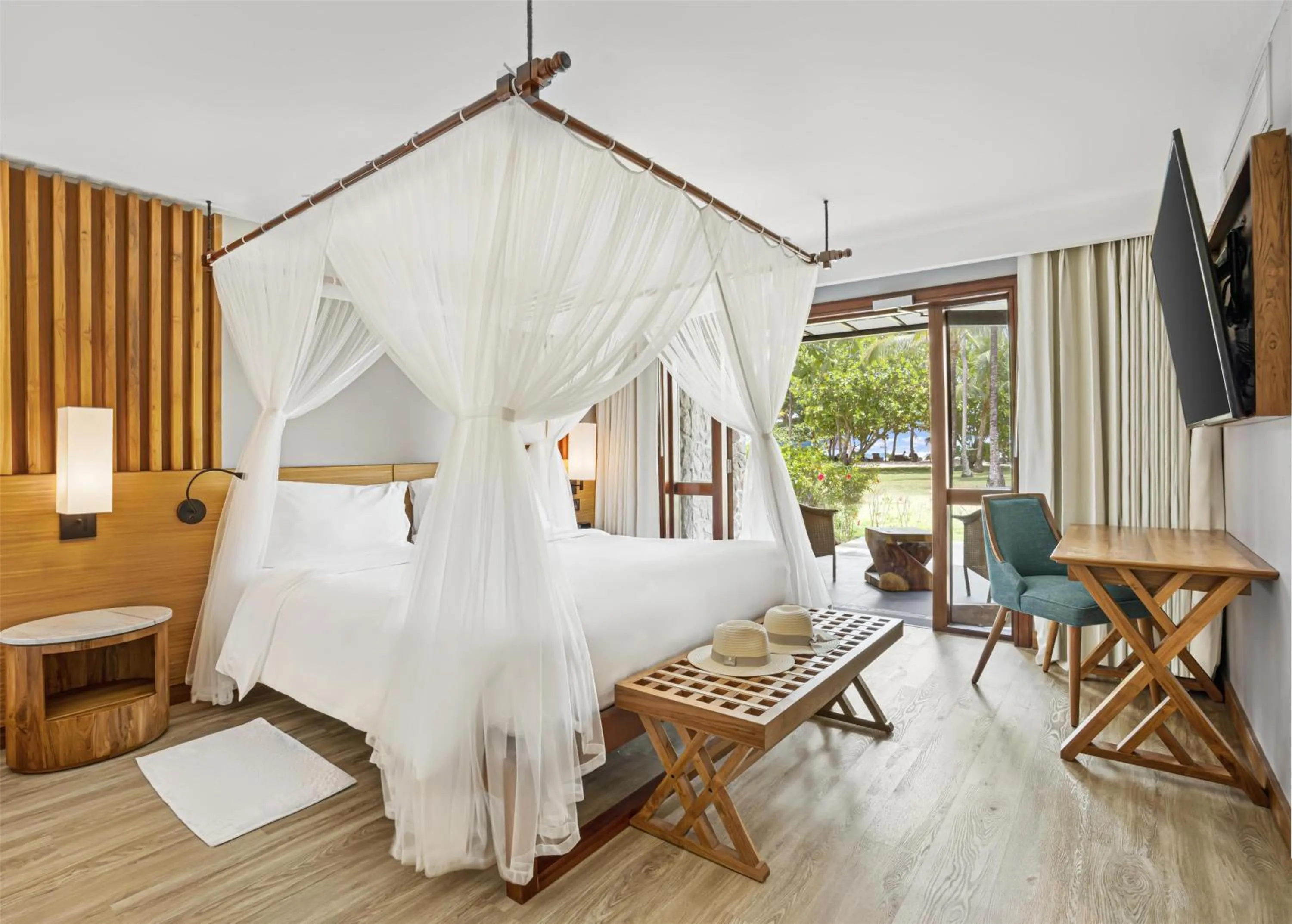 Property building, Bed in Kempinski Seychelles Resort