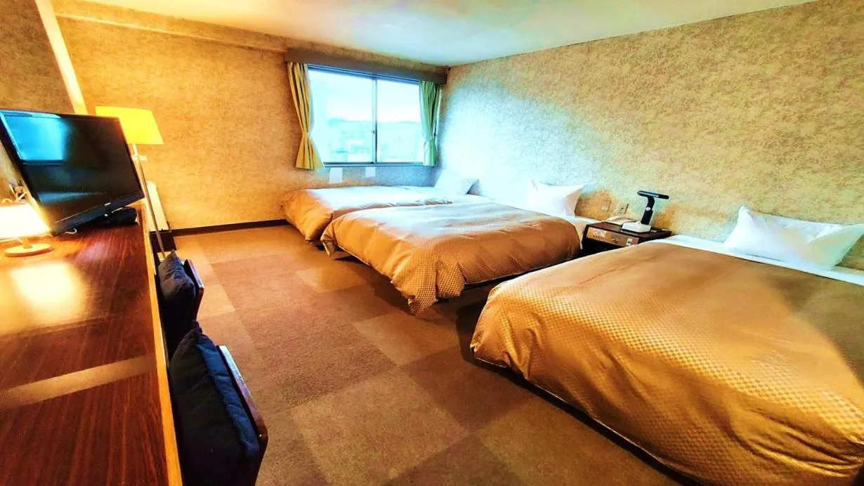 Bed in Hotel Sakuranbo