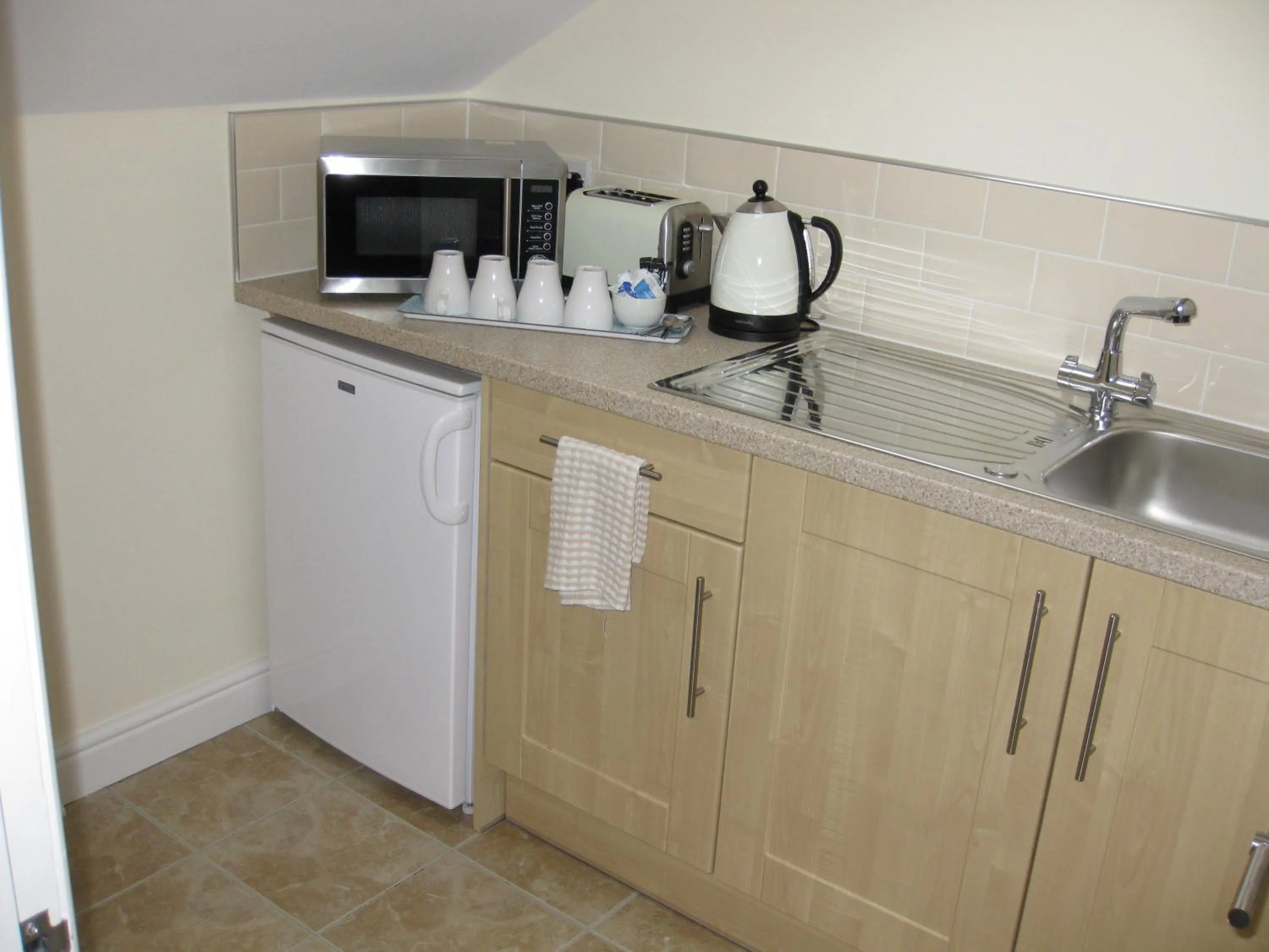 Kitchen or kitchenette in Austins Guest House