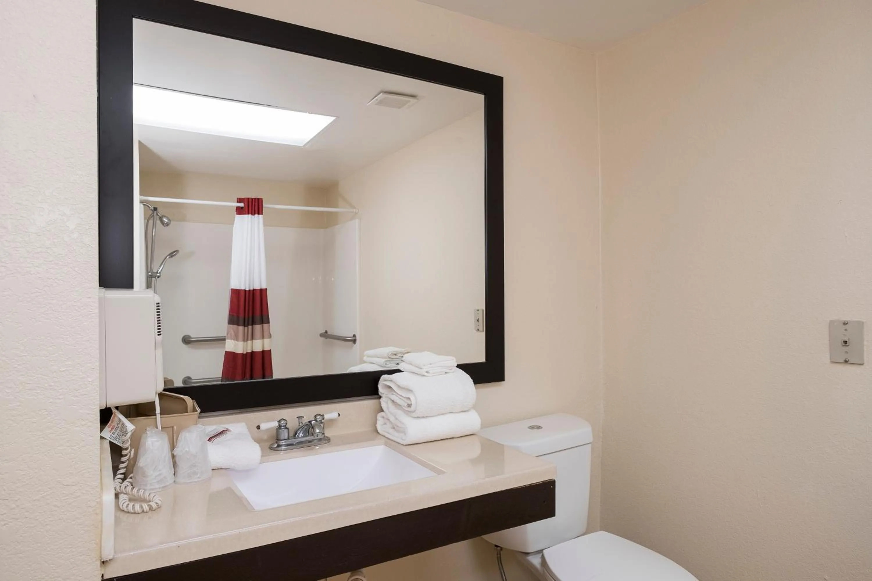 Bathroom in Red Roof Inn PLUS+ & Suites Opelika