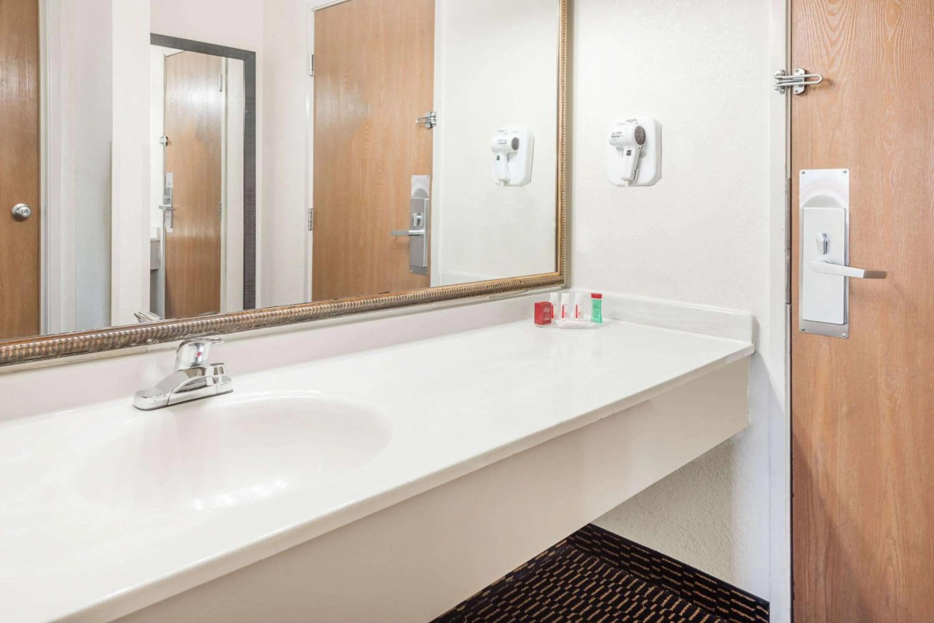 Bathroom in Ramada by Wyndham Columbia