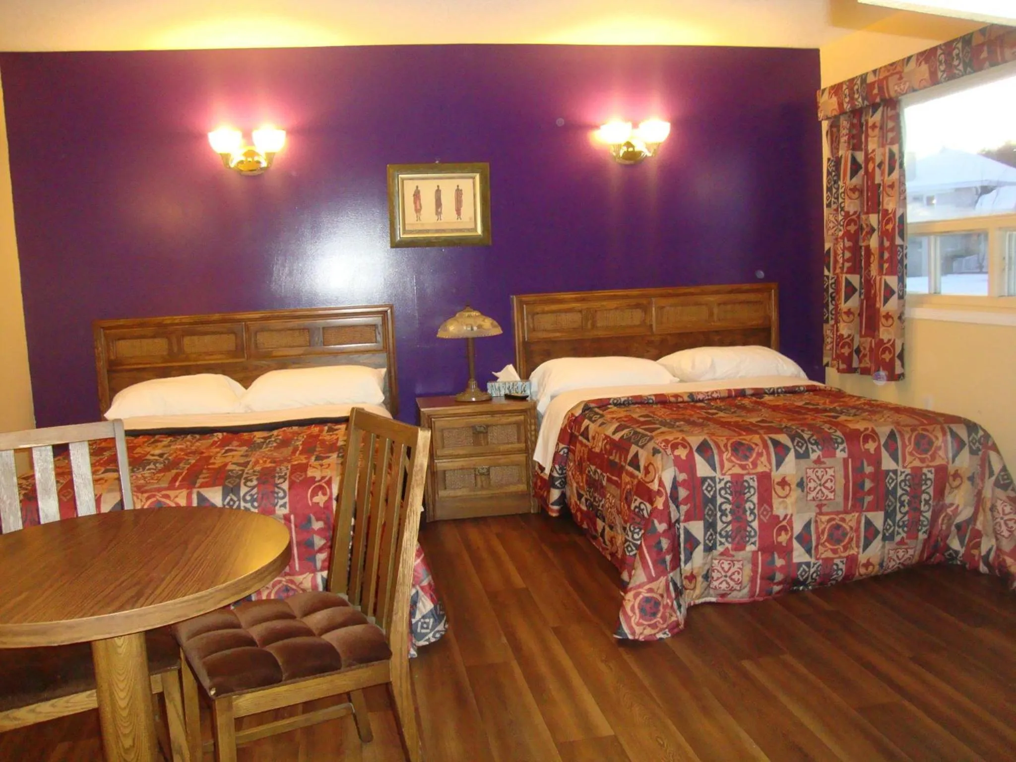 Bed in Hotel Motel Hospitalité