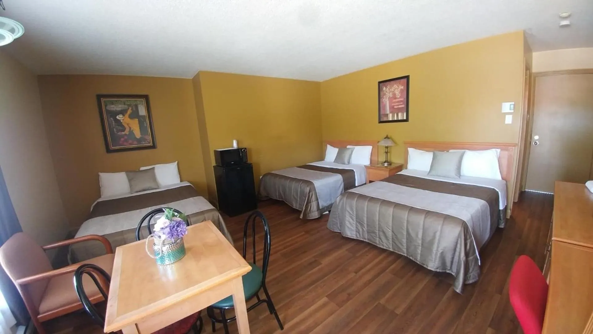 Photo of the whole room, Bed in Hotel Motel Hospitalité