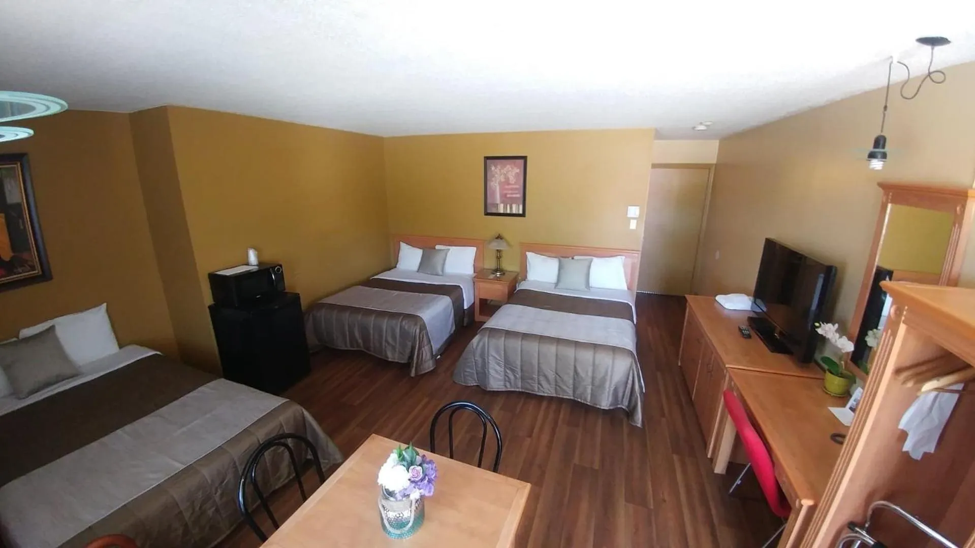 Photo of the whole room, Bed in Hotel Motel Hospitalité