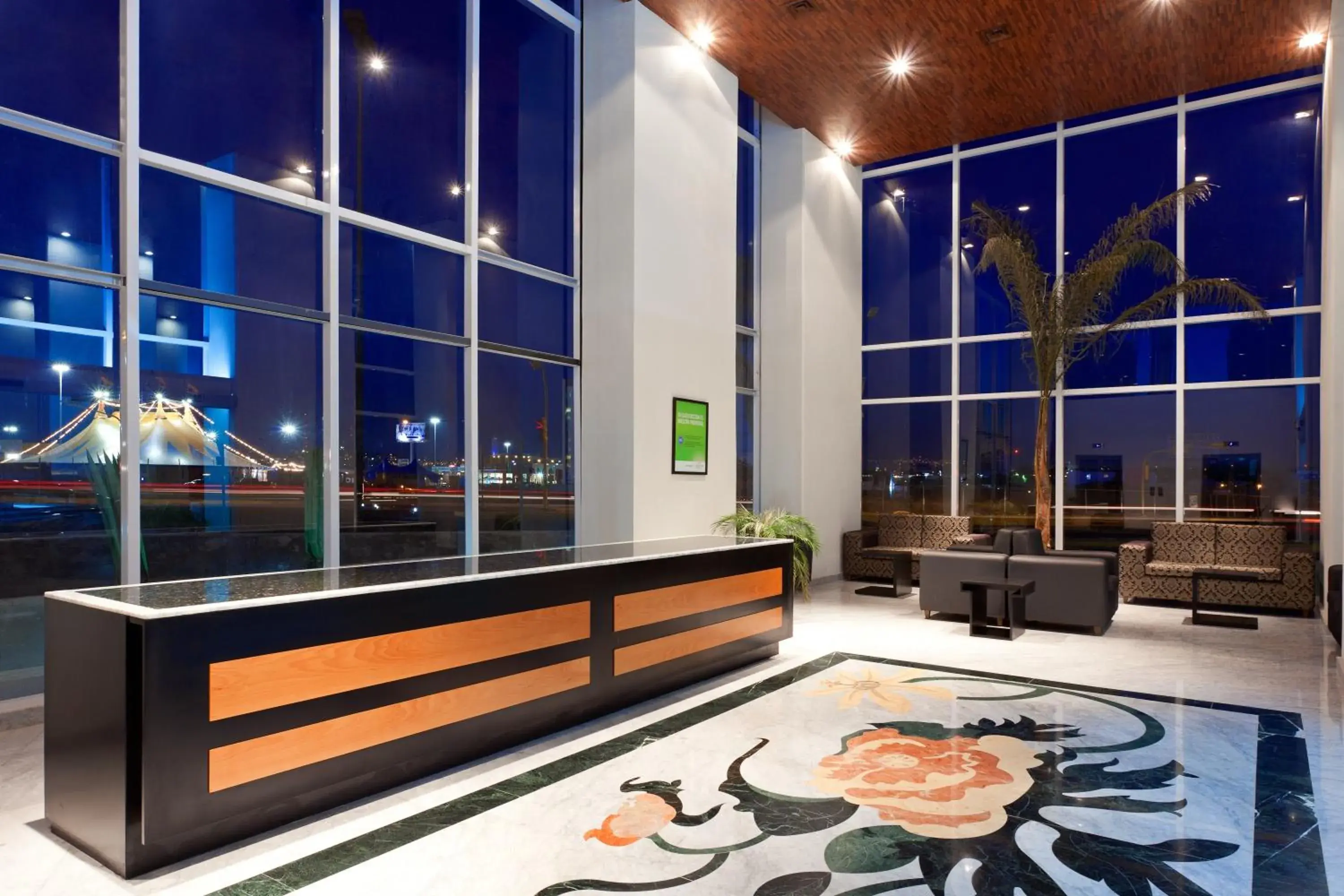 Lobby or reception in La Quinta by Wyndham Puebla Palmas Angelopolis Lobby or reception in La Quinta by Wyndham Puebla Palmas Angelopolis