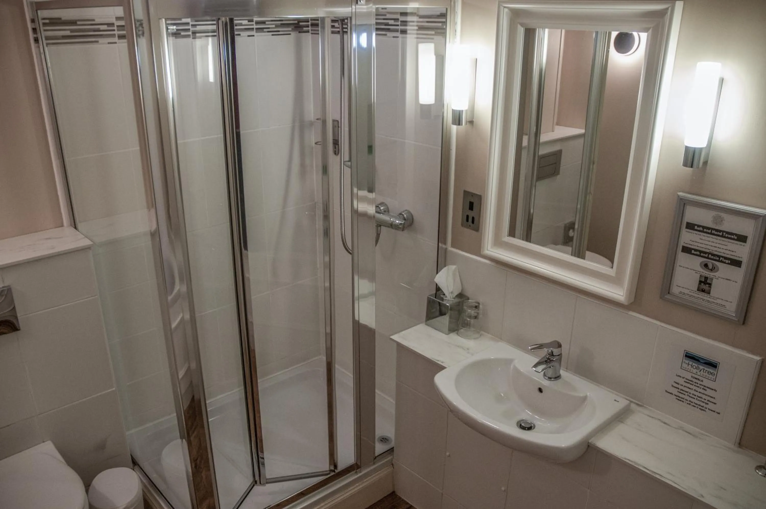 Shower in Holly Tree Hotel, Swimming Pool & Hot Tub