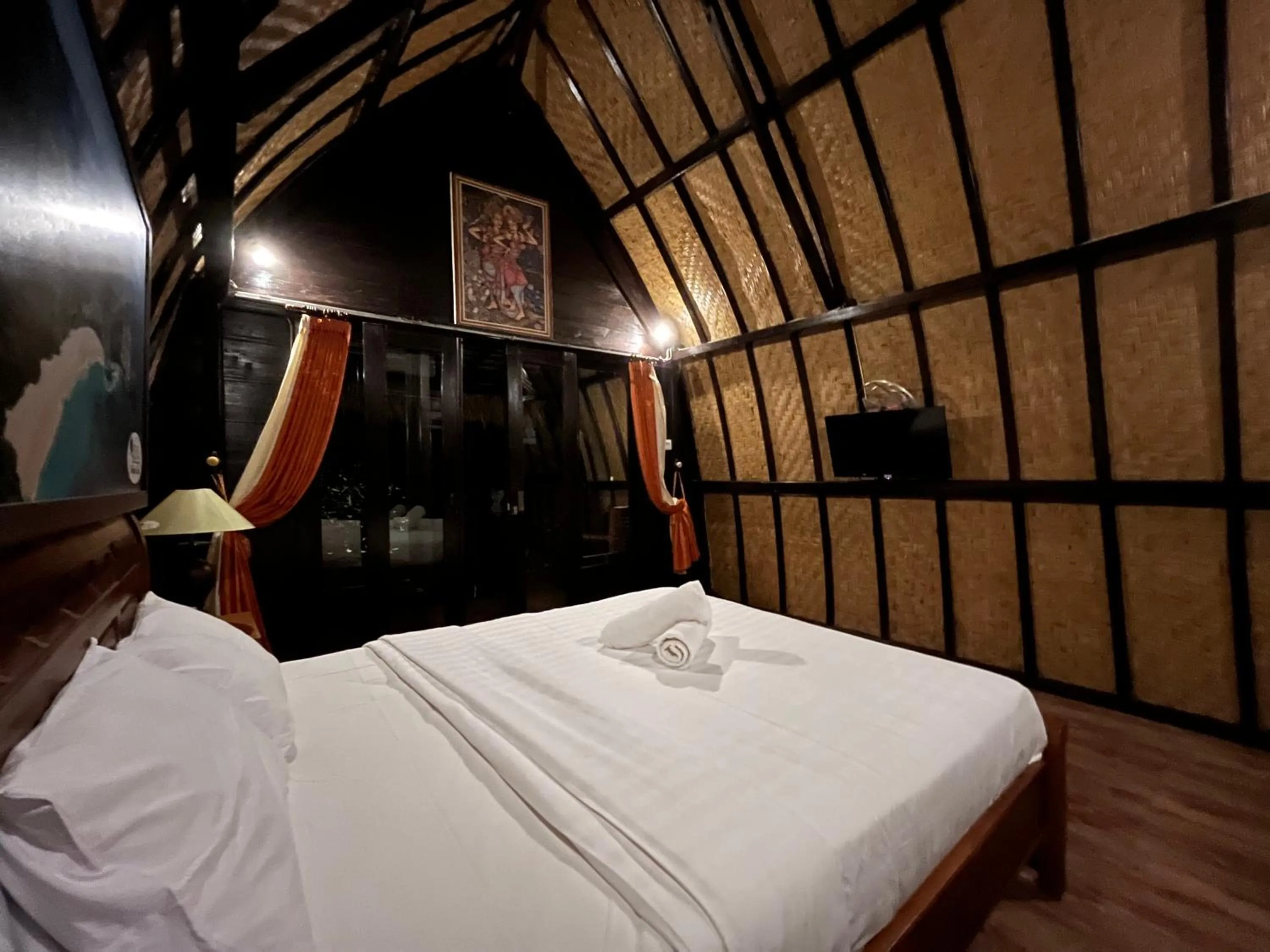 Bed in Holy Hills Bungalow Nusa Penida
