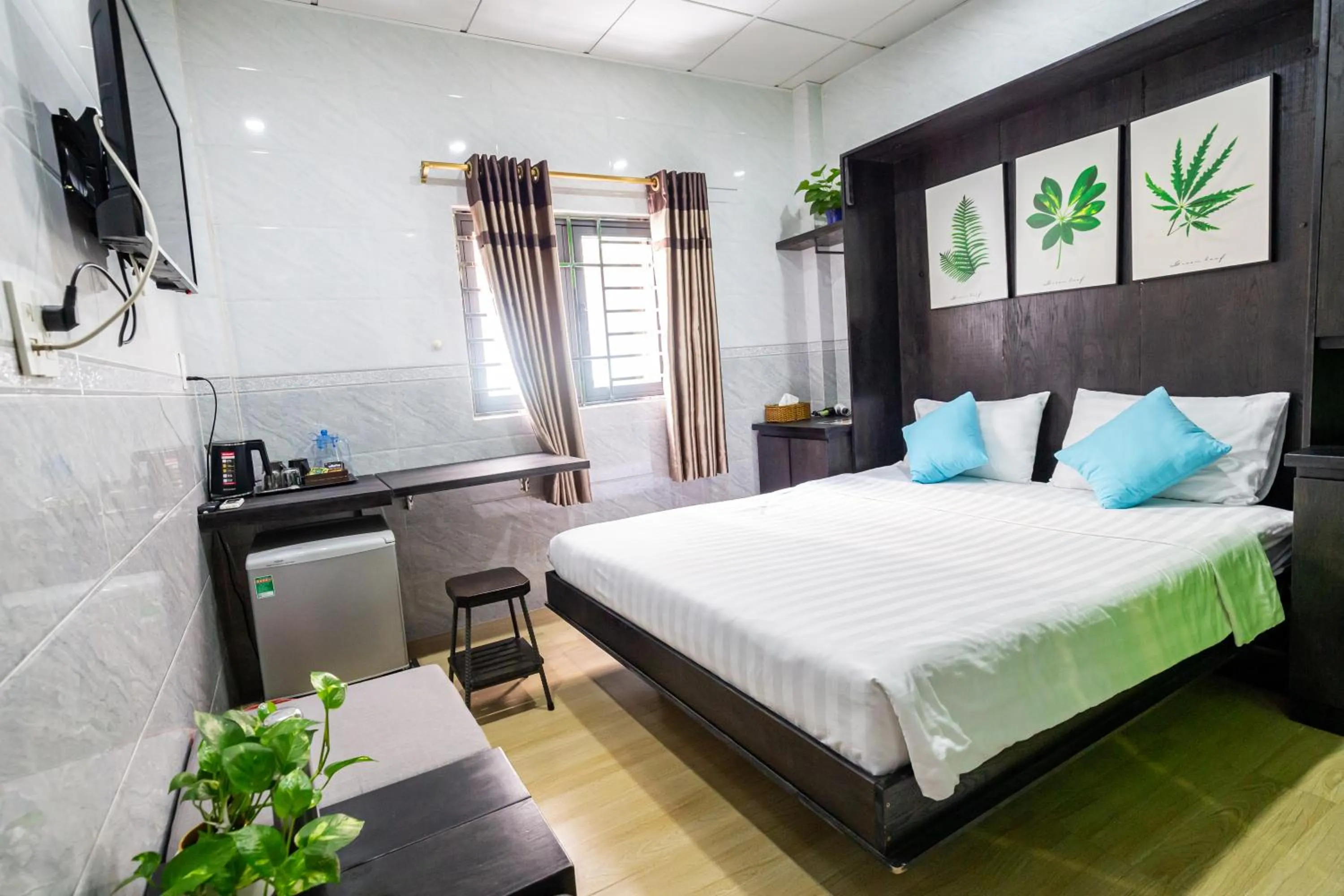 Photo of the whole room, Bed in Cola's Homestay