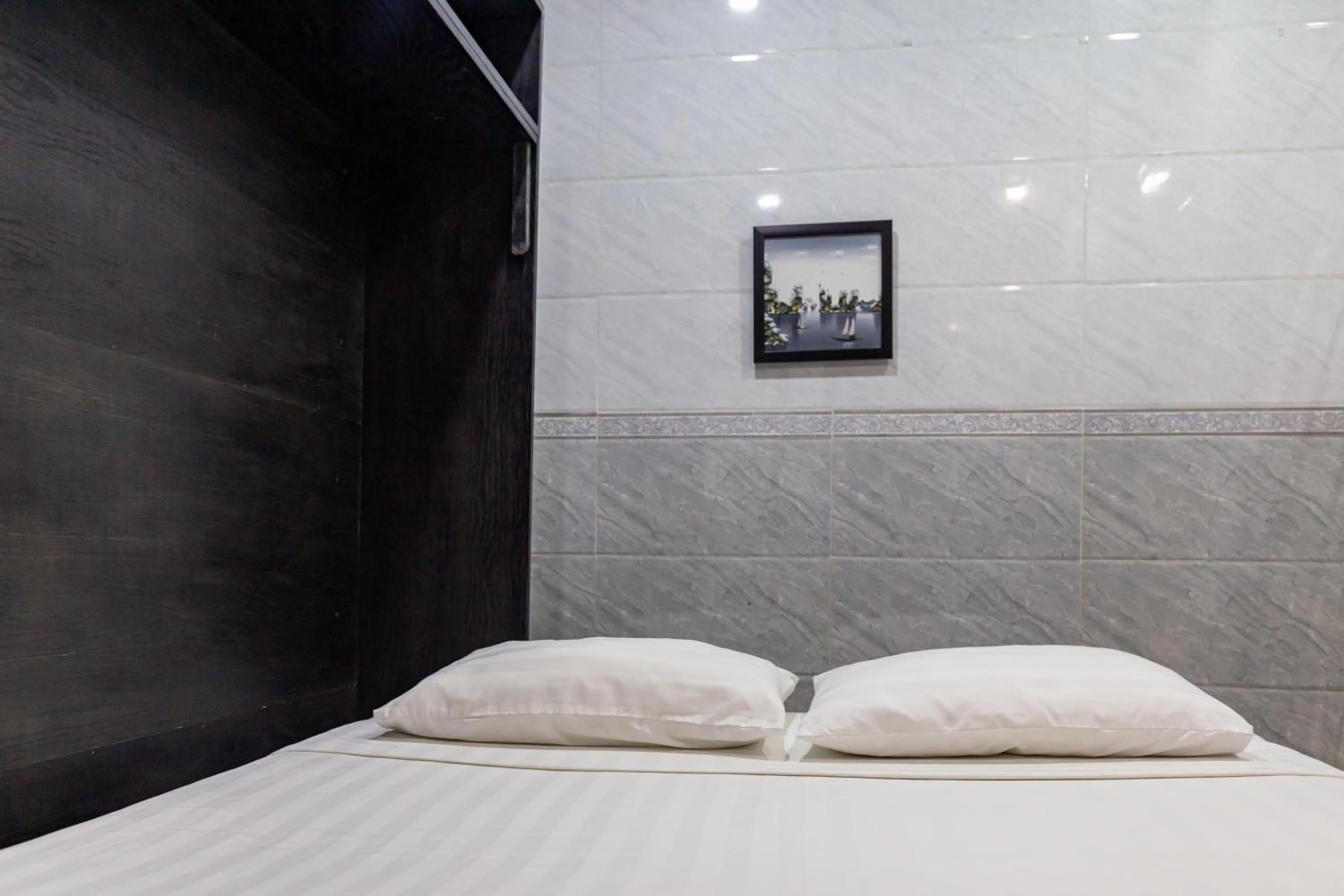 Bed in Cola's Homestay