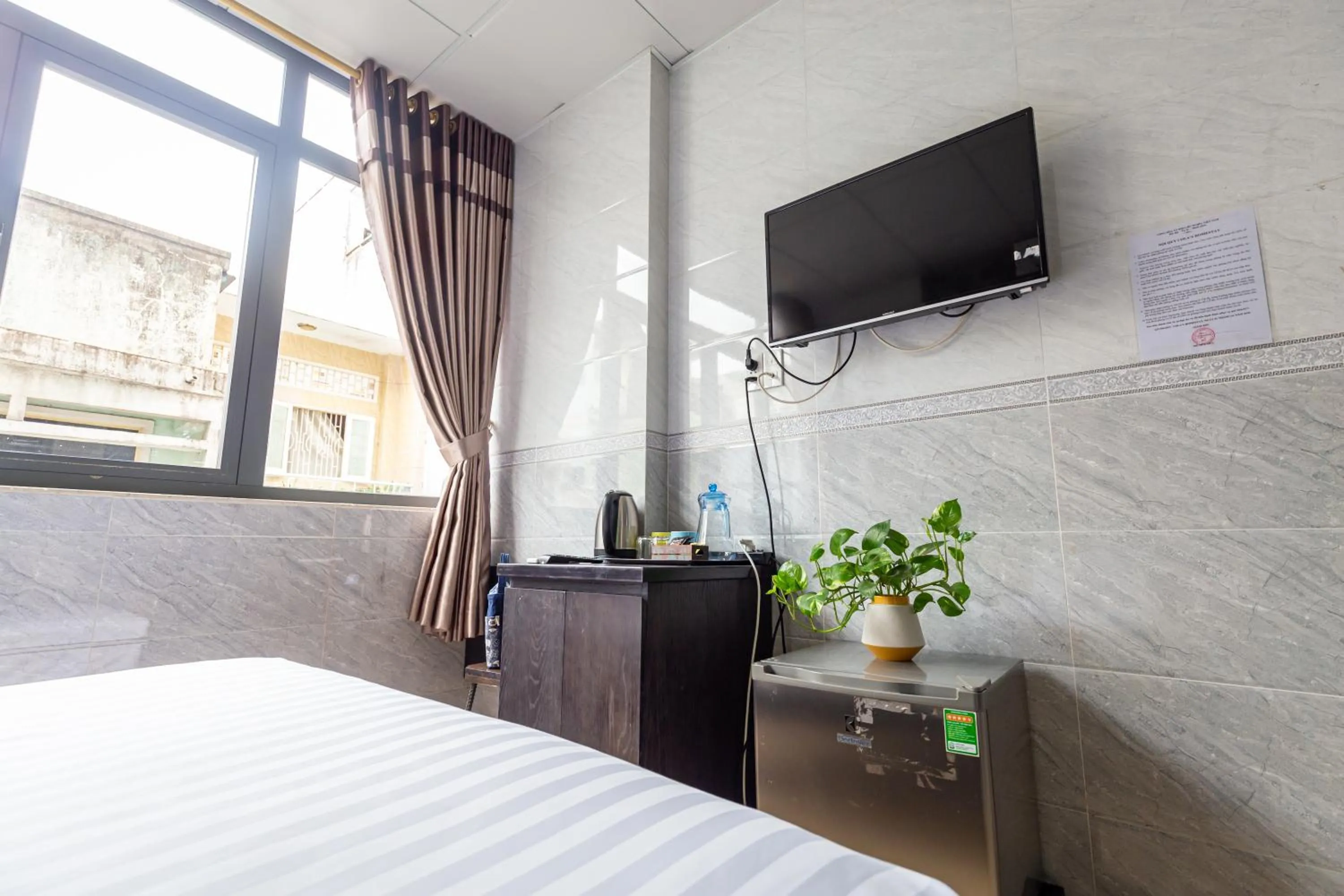 Photo of the whole room, Bed in Cola's Homestay