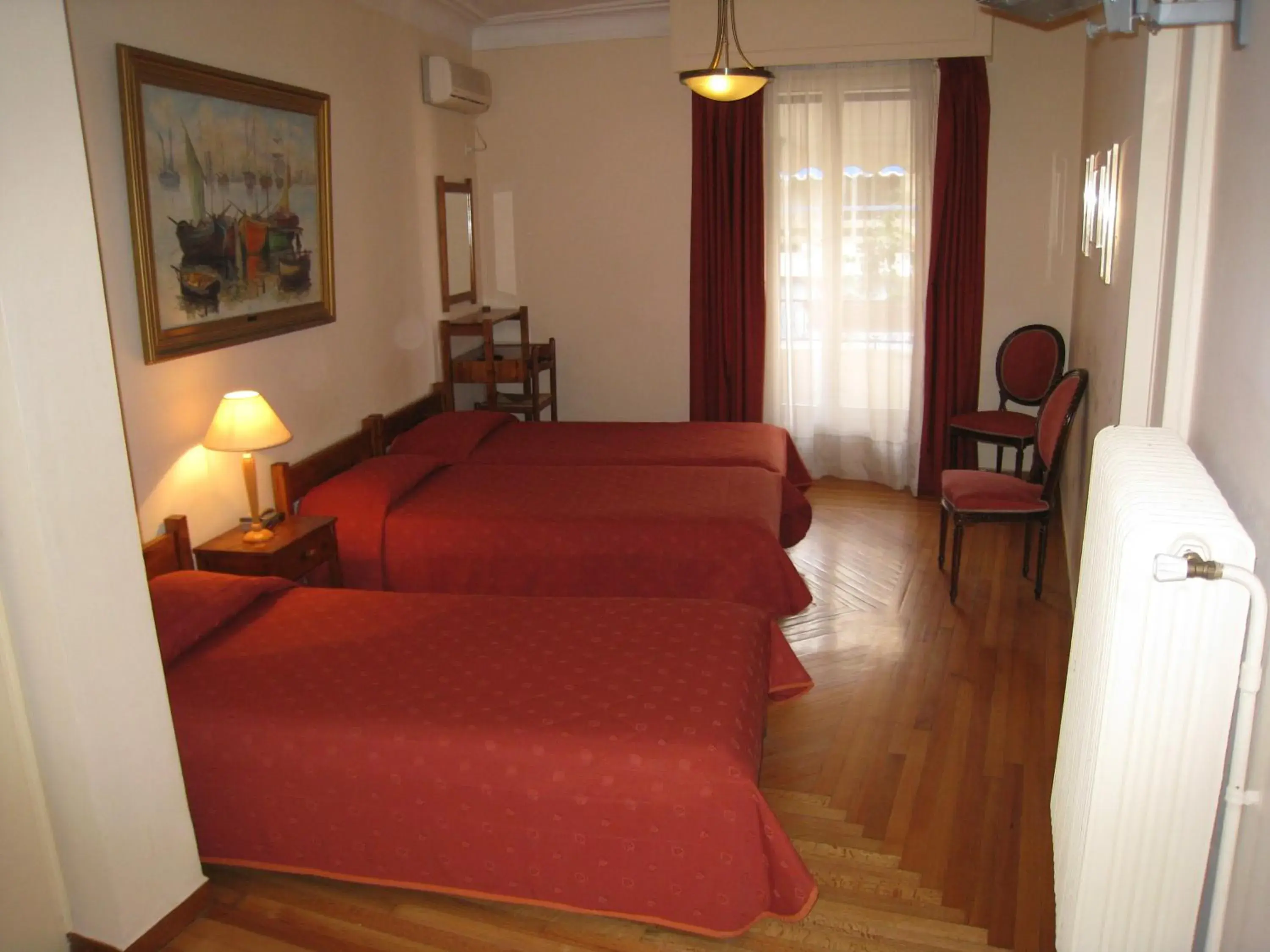 Triple Room in Art Gallery Hotel Triple Room in Art Gallery Hotel