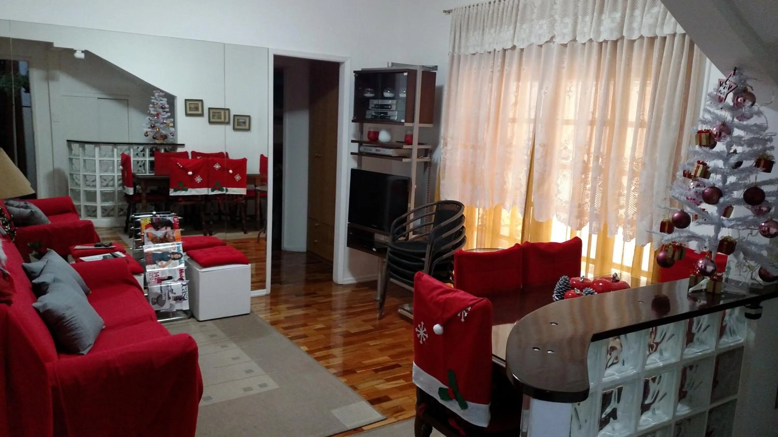 Seating area in Aconchegante ao lado do shopping com garagem e Wifi