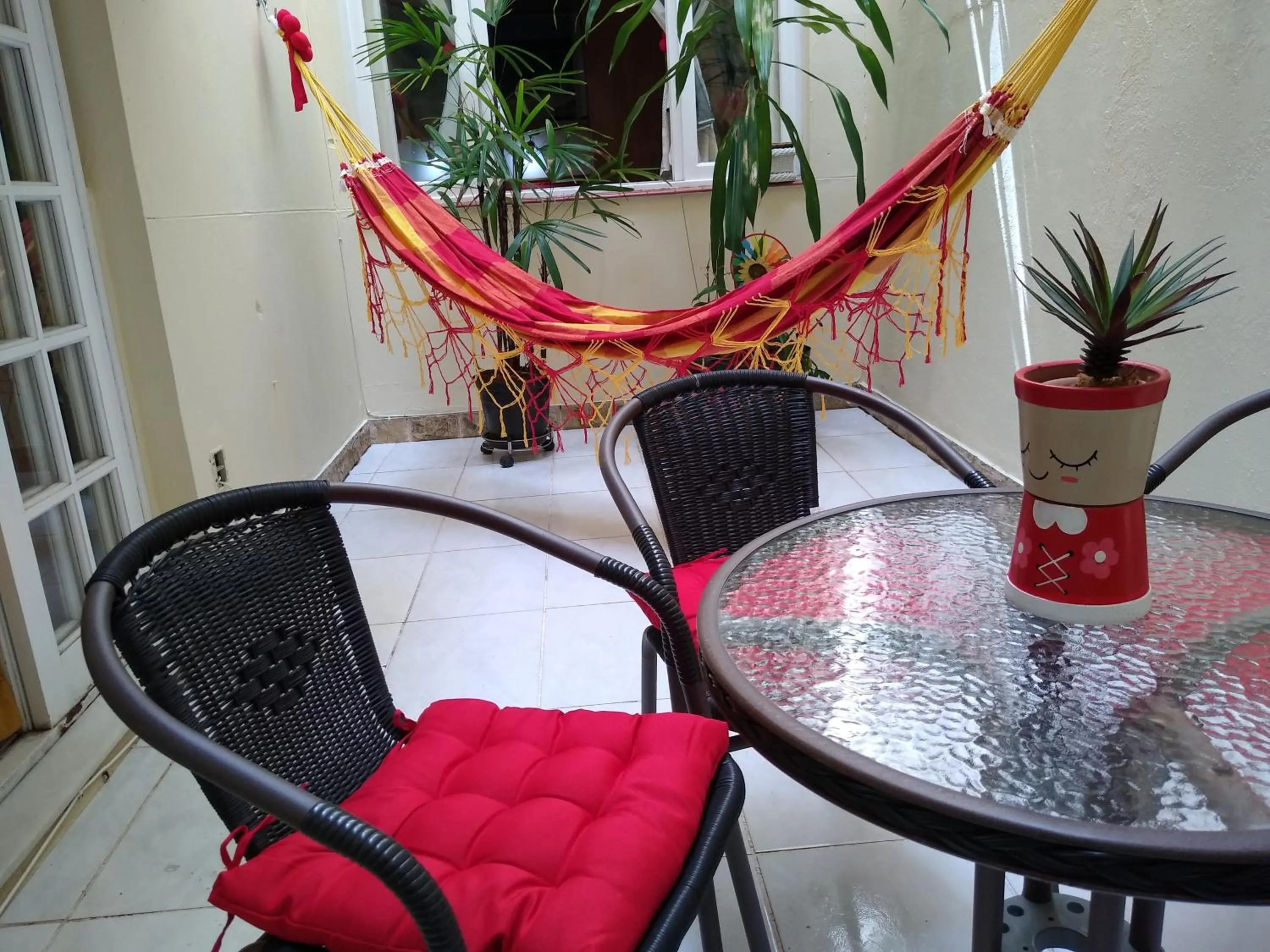 Patio in Aconchegante ao lado do shopping com garagem e Wifi