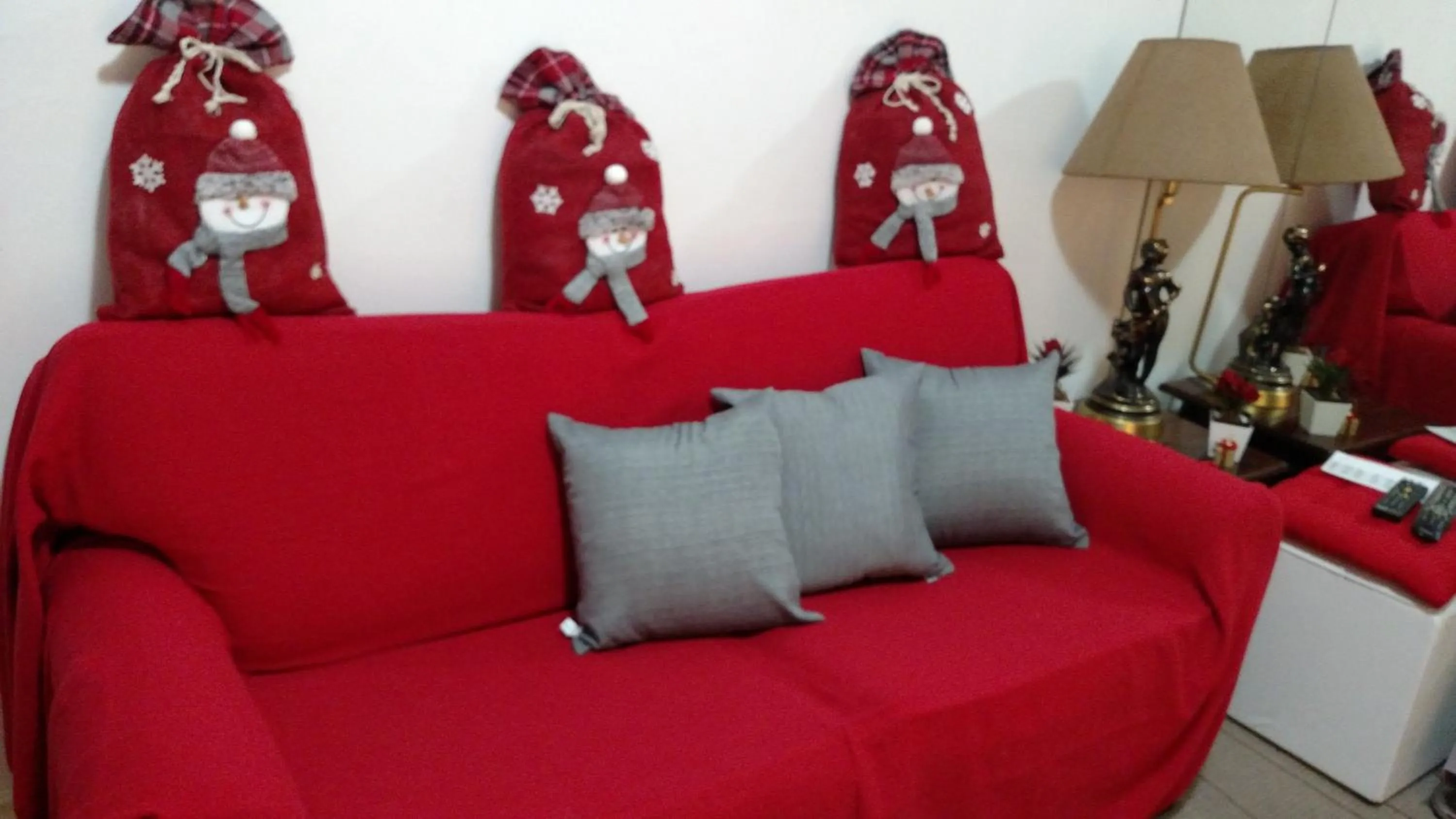 Living room in Aconchegante ao lado do shopping com garagem e Wifi
