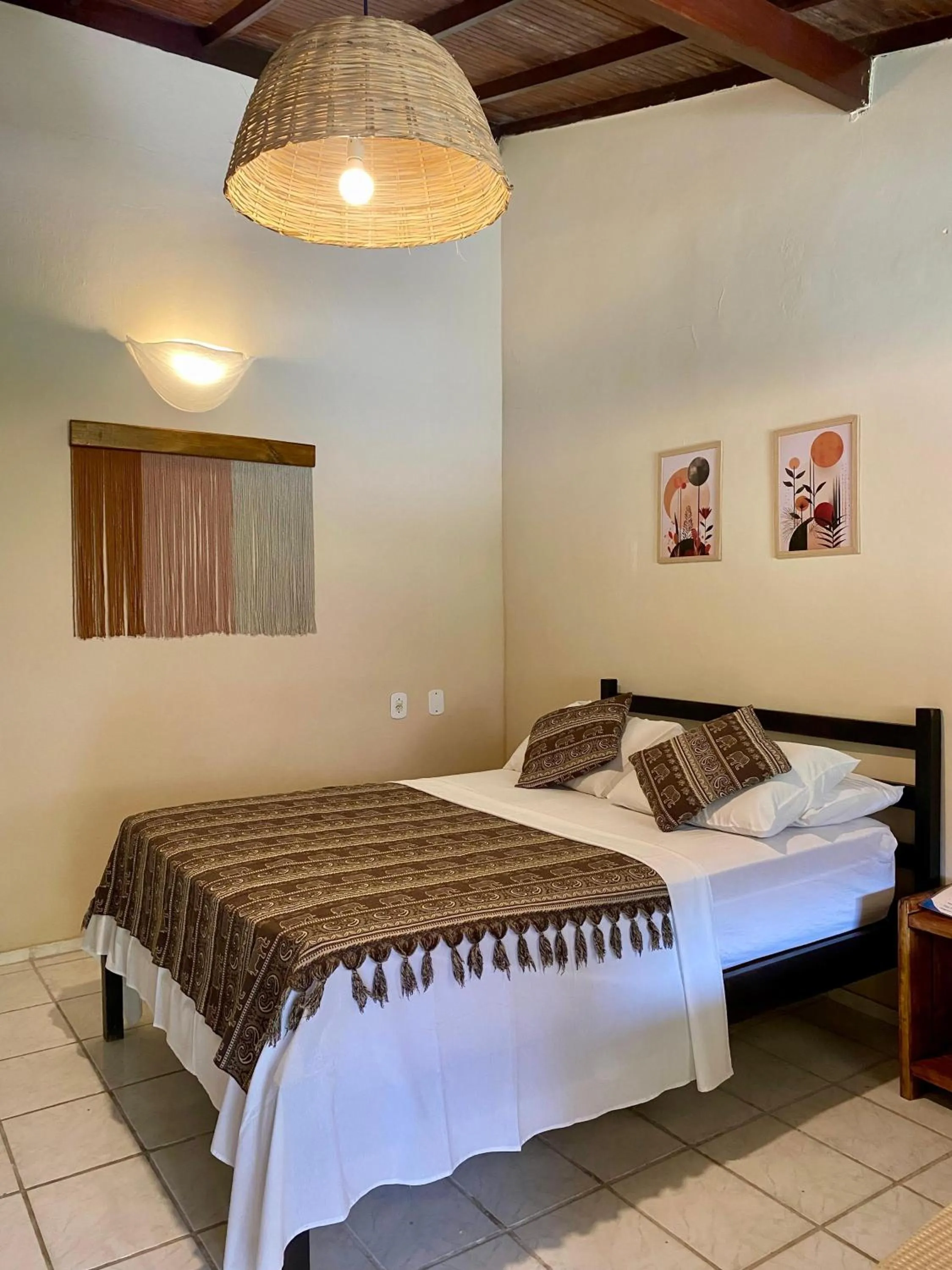 Bed in Pousada Tubarão