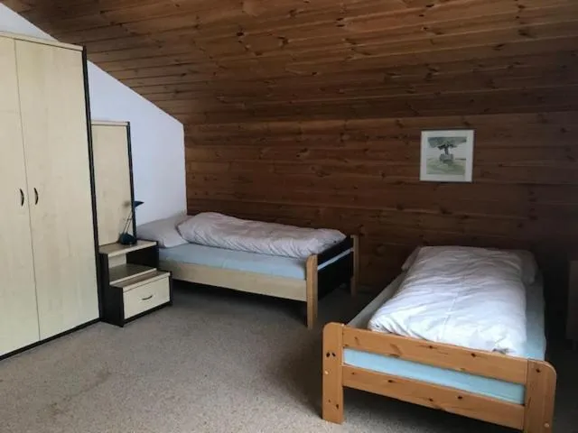 Bed in Hotel Alpina