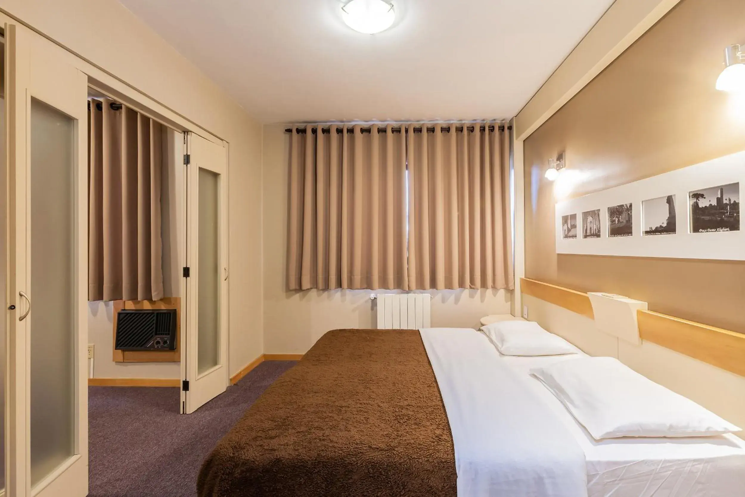 Bed in Tri Hotel & Flat Caxias Bed in Tri Hotel & Flat Caxias