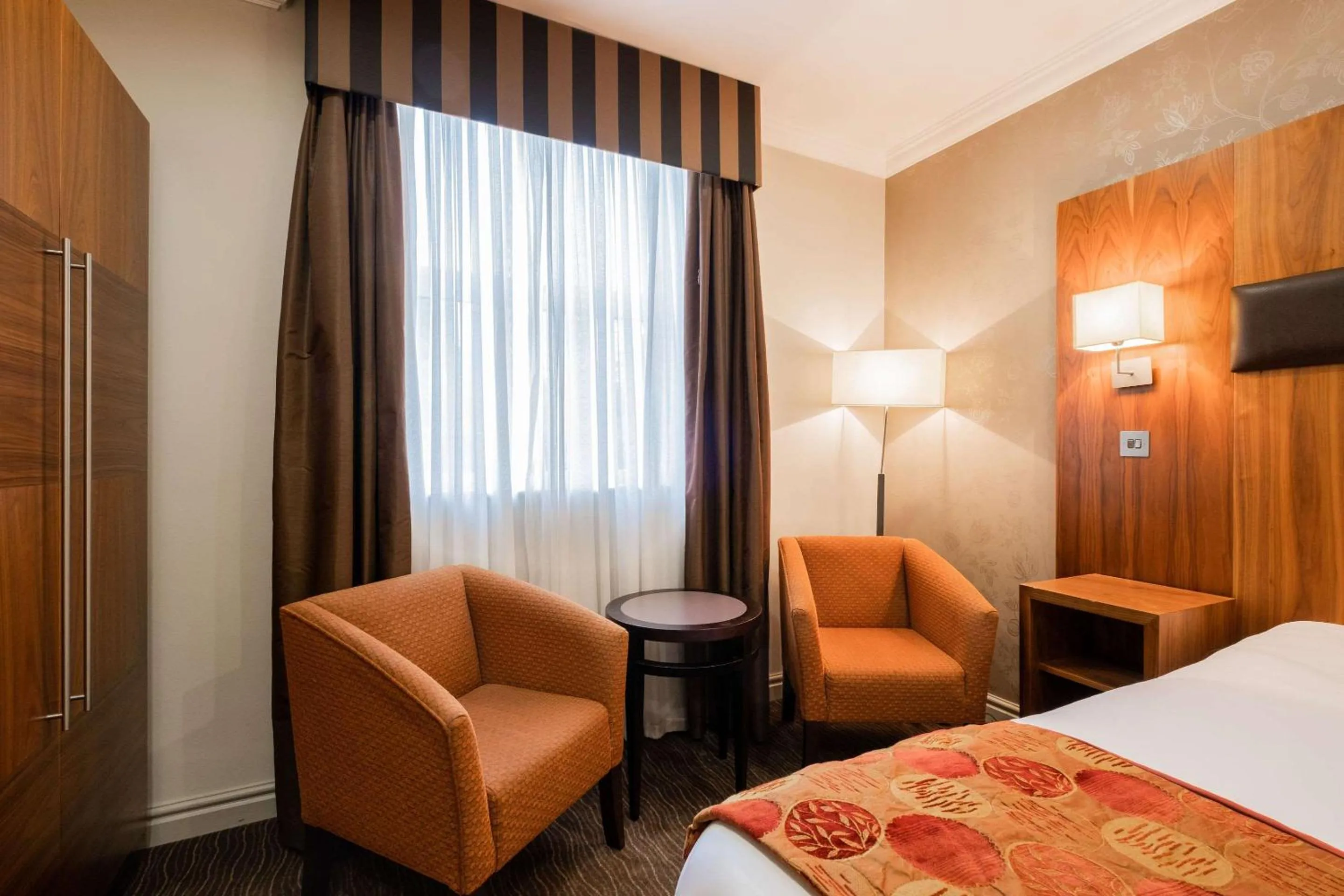 Bed in Ramada by Wyndham Cheltenham