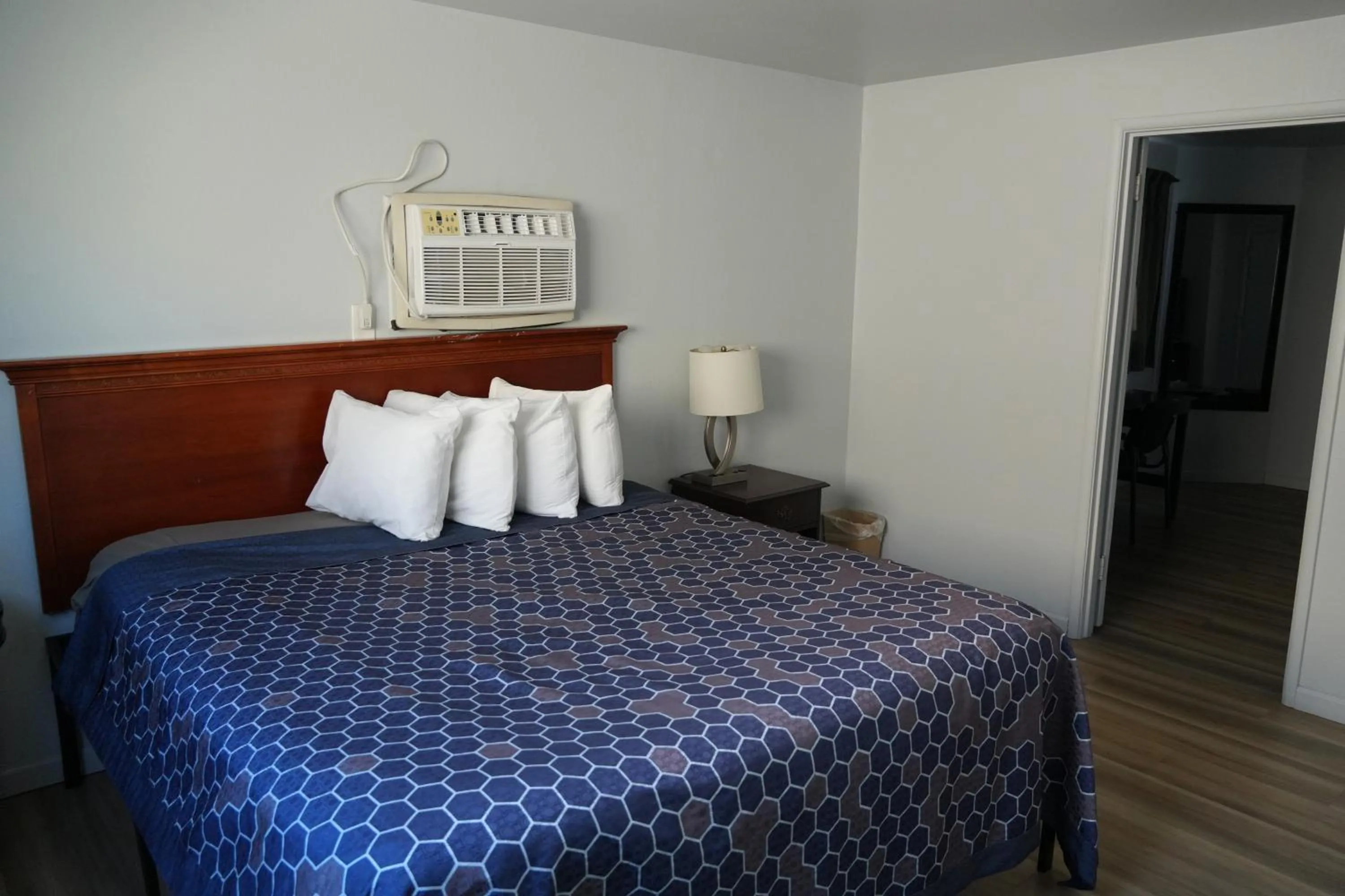 Bed in La Hacienda Motel
