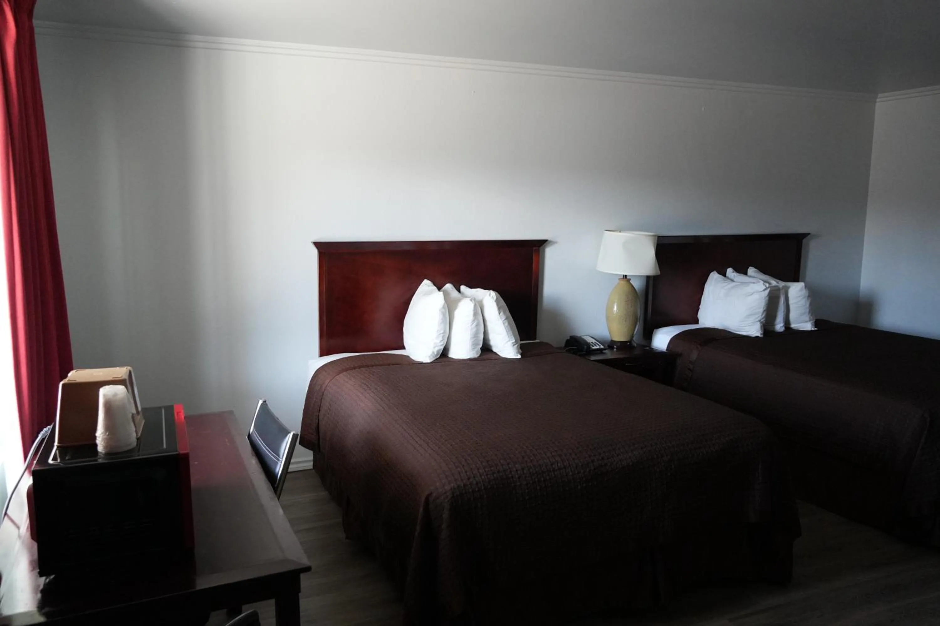 Bed in La Hacienda Motel
