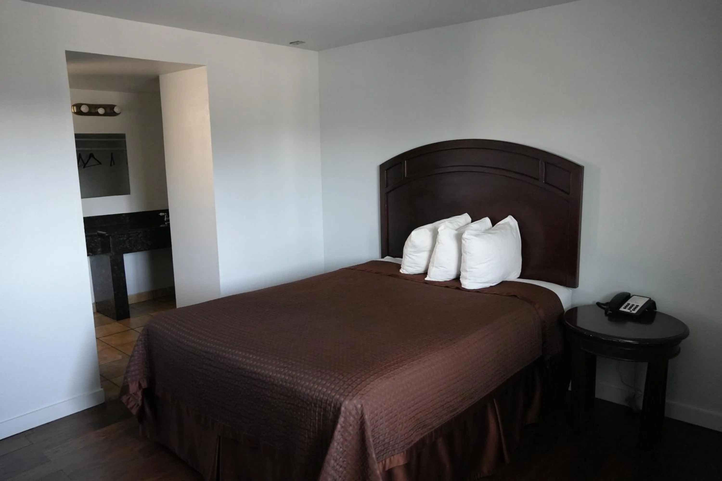 Bed in La Hacienda Motel