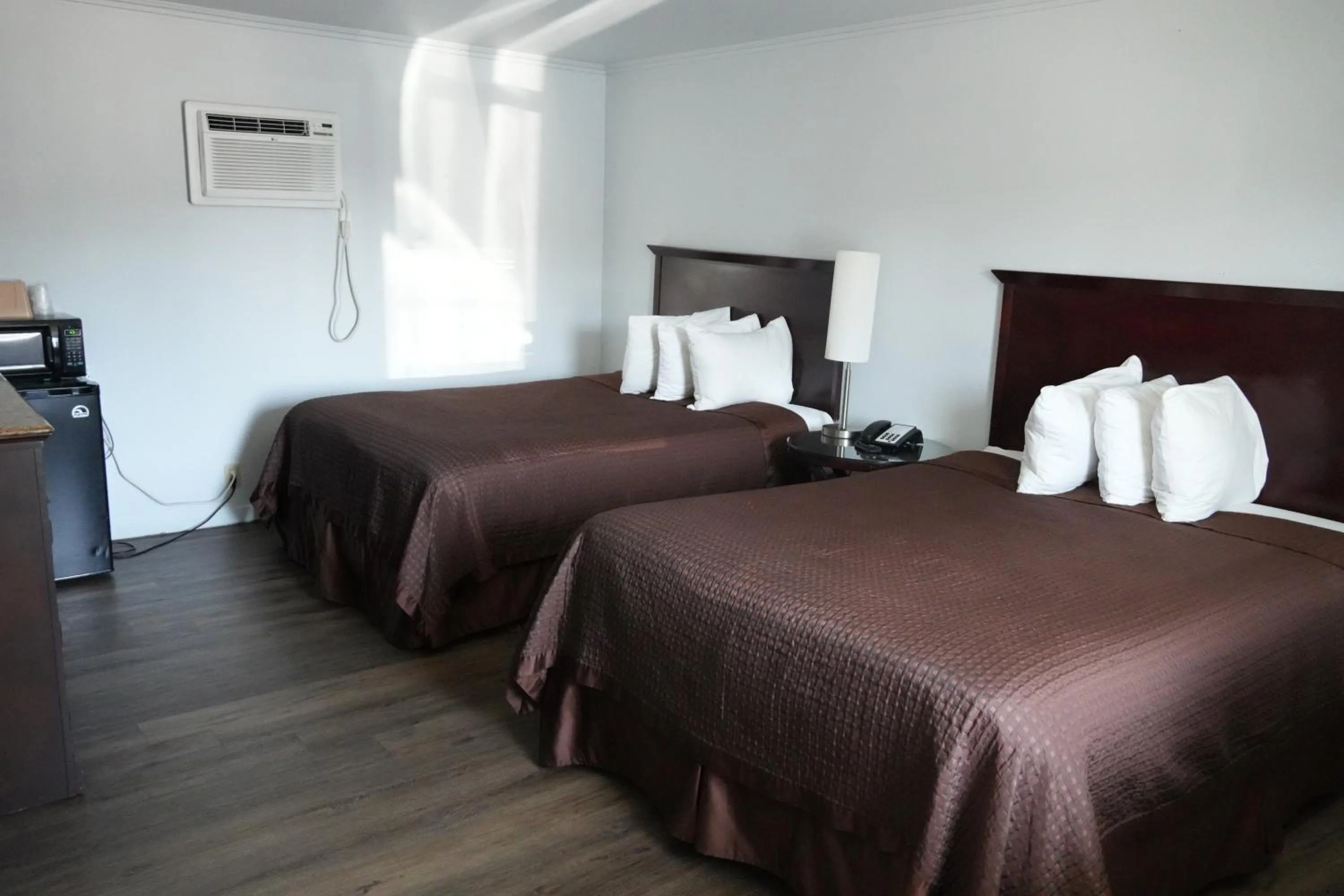 Bed in La Hacienda Motel