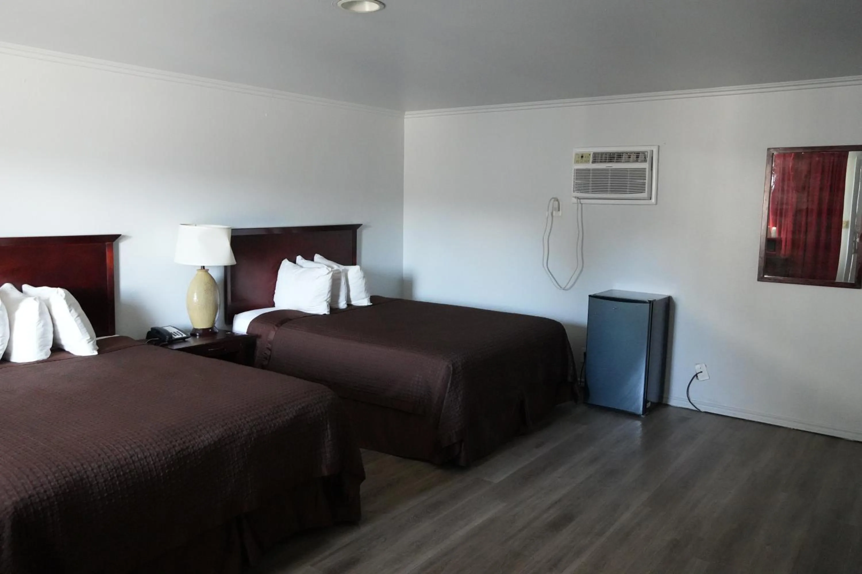 Bed in La Hacienda Motel