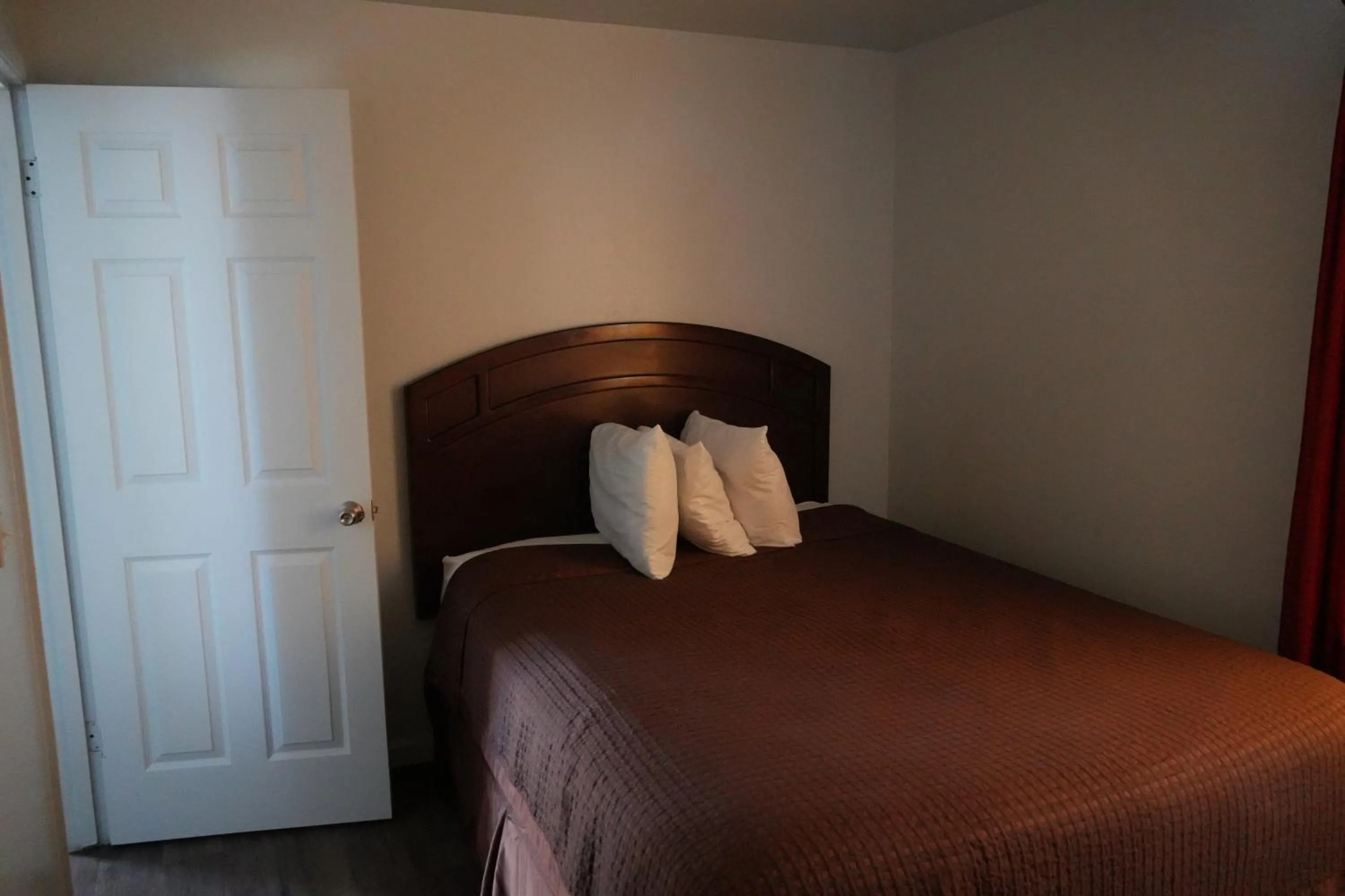 Bed in La Hacienda Motel
