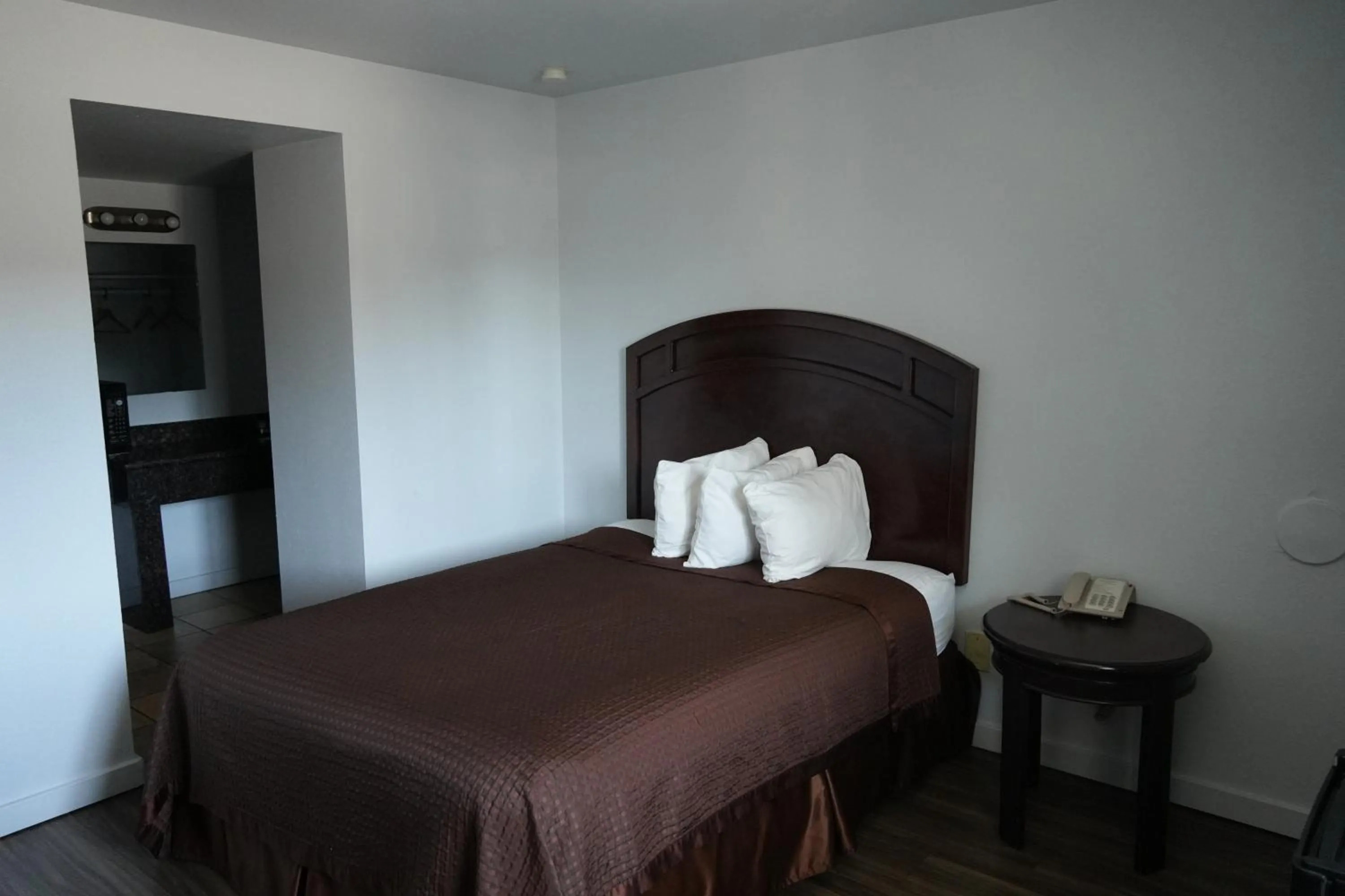 Bed in La Hacienda Motel