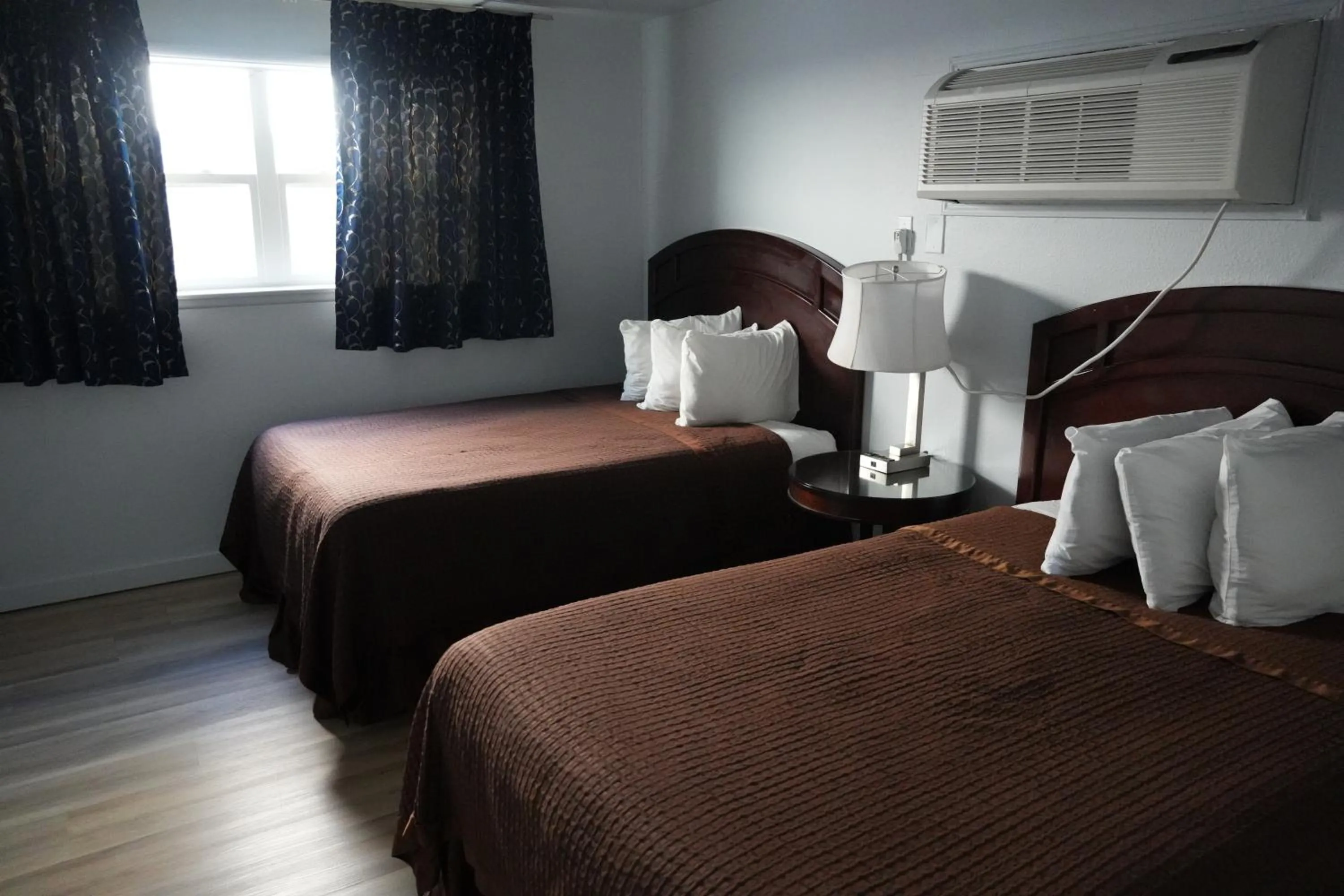 Bed in La Hacienda Motel