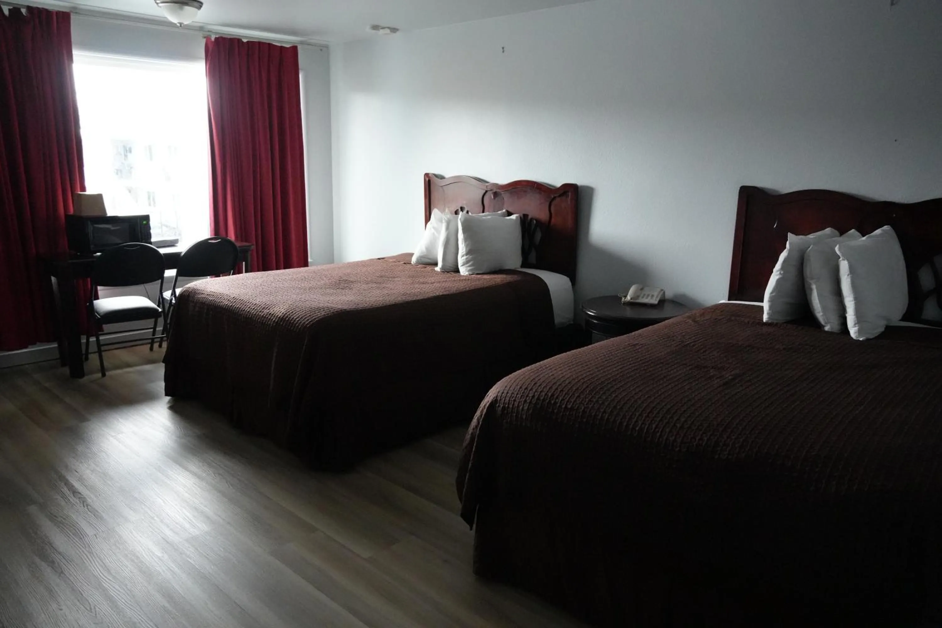 Bed in La Hacienda Motel