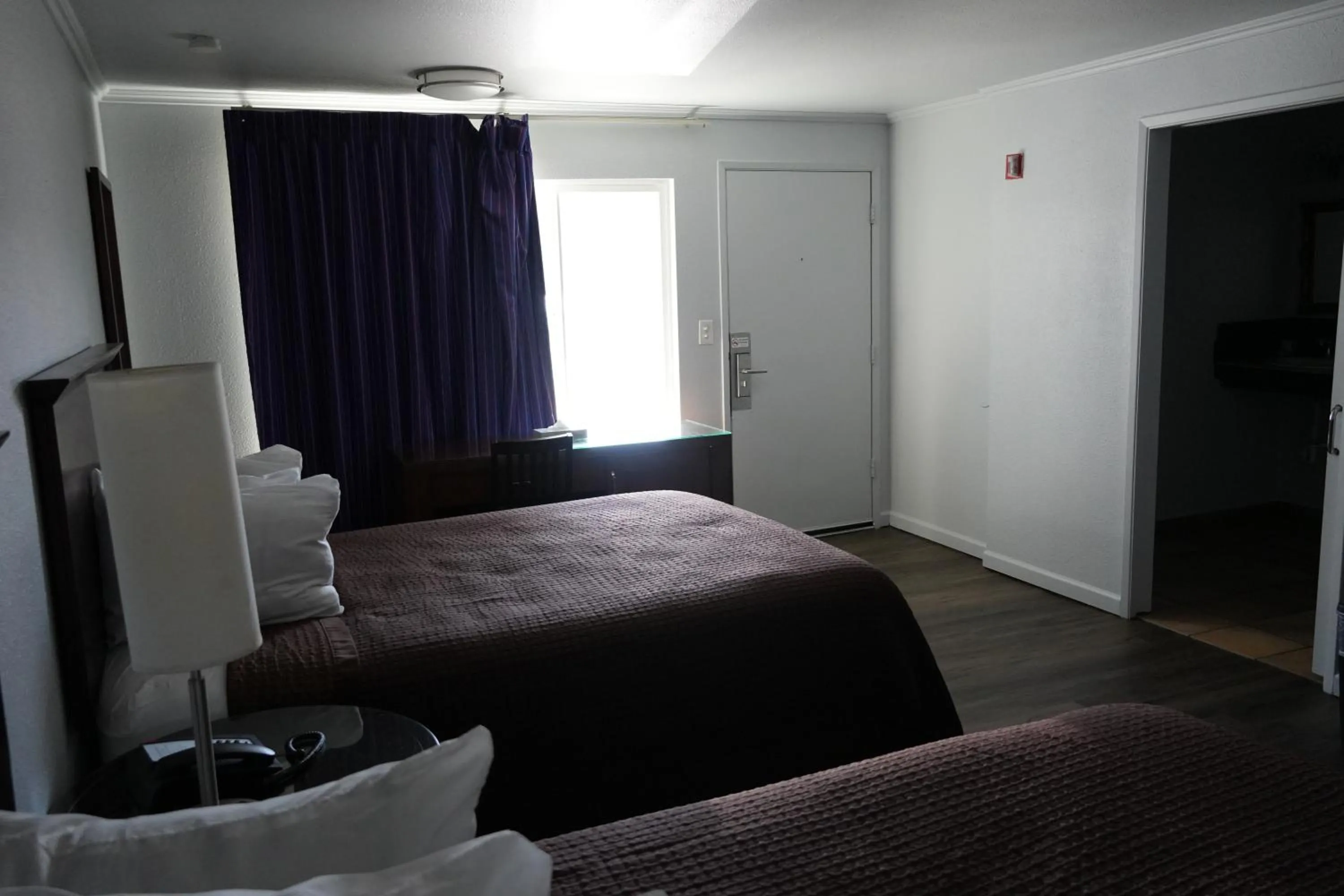 Bed in La Hacienda Motel
