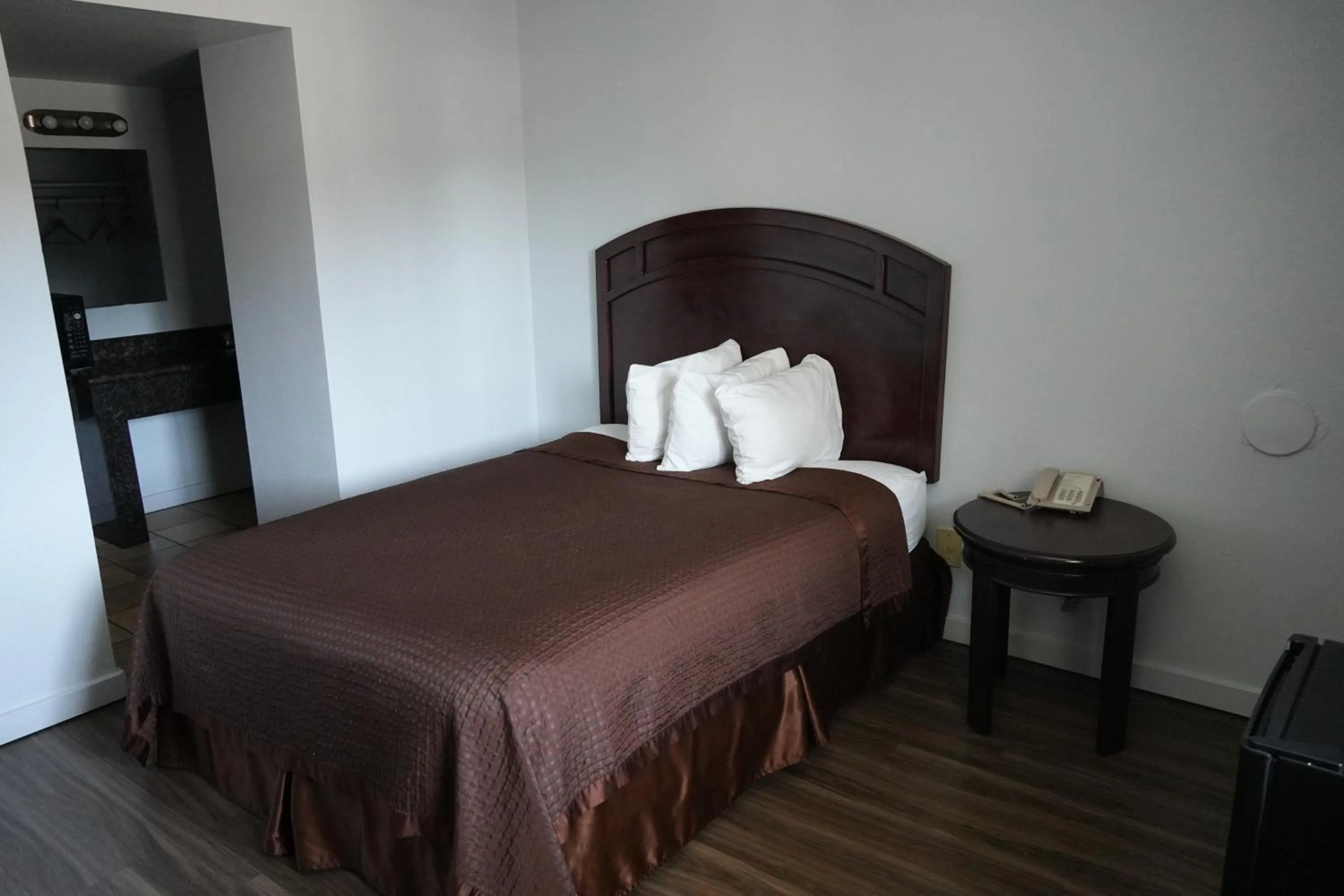 Bed in La Hacienda Motel