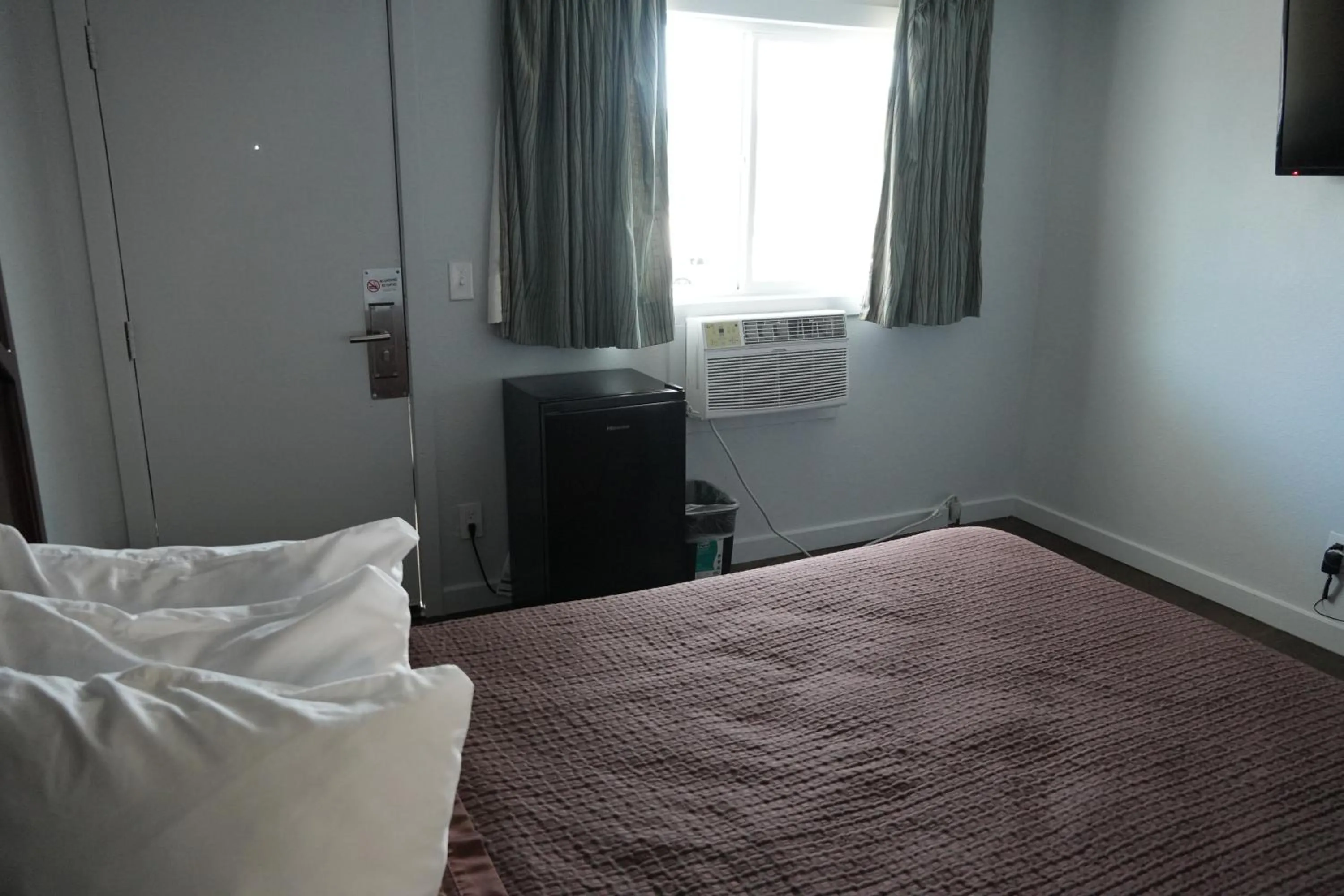 Bed in La Hacienda Motel