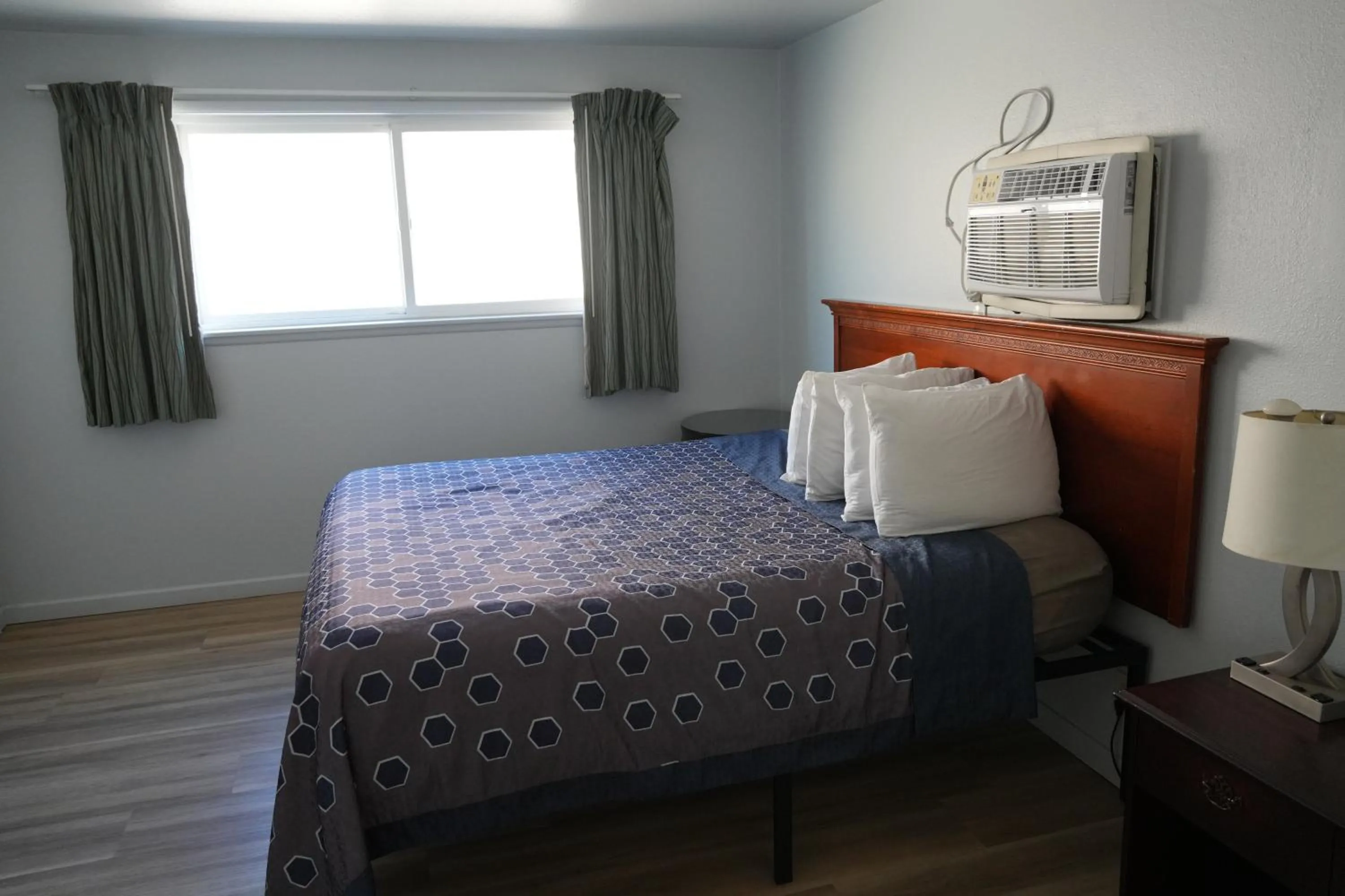 Bed in La Hacienda Motel