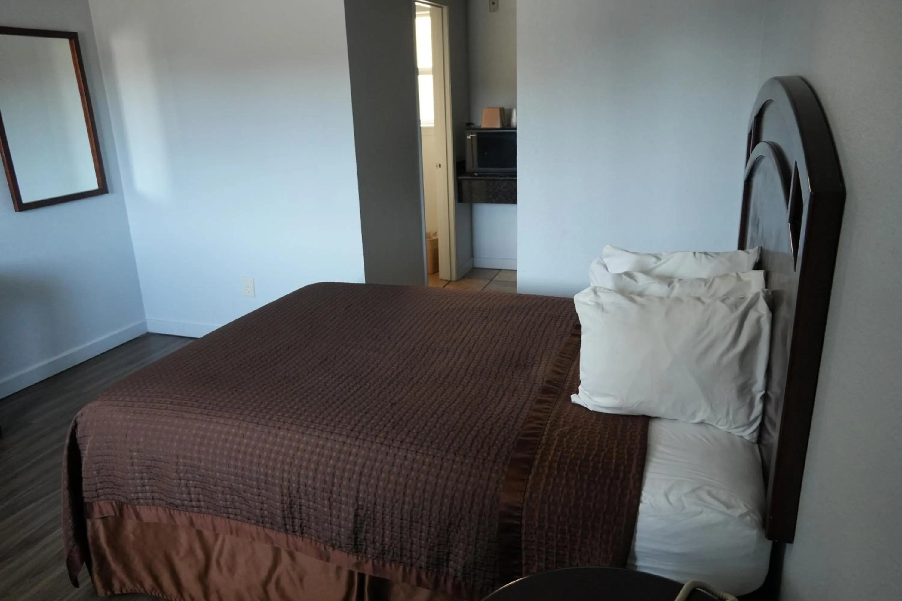 Bed in La Hacienda Motel