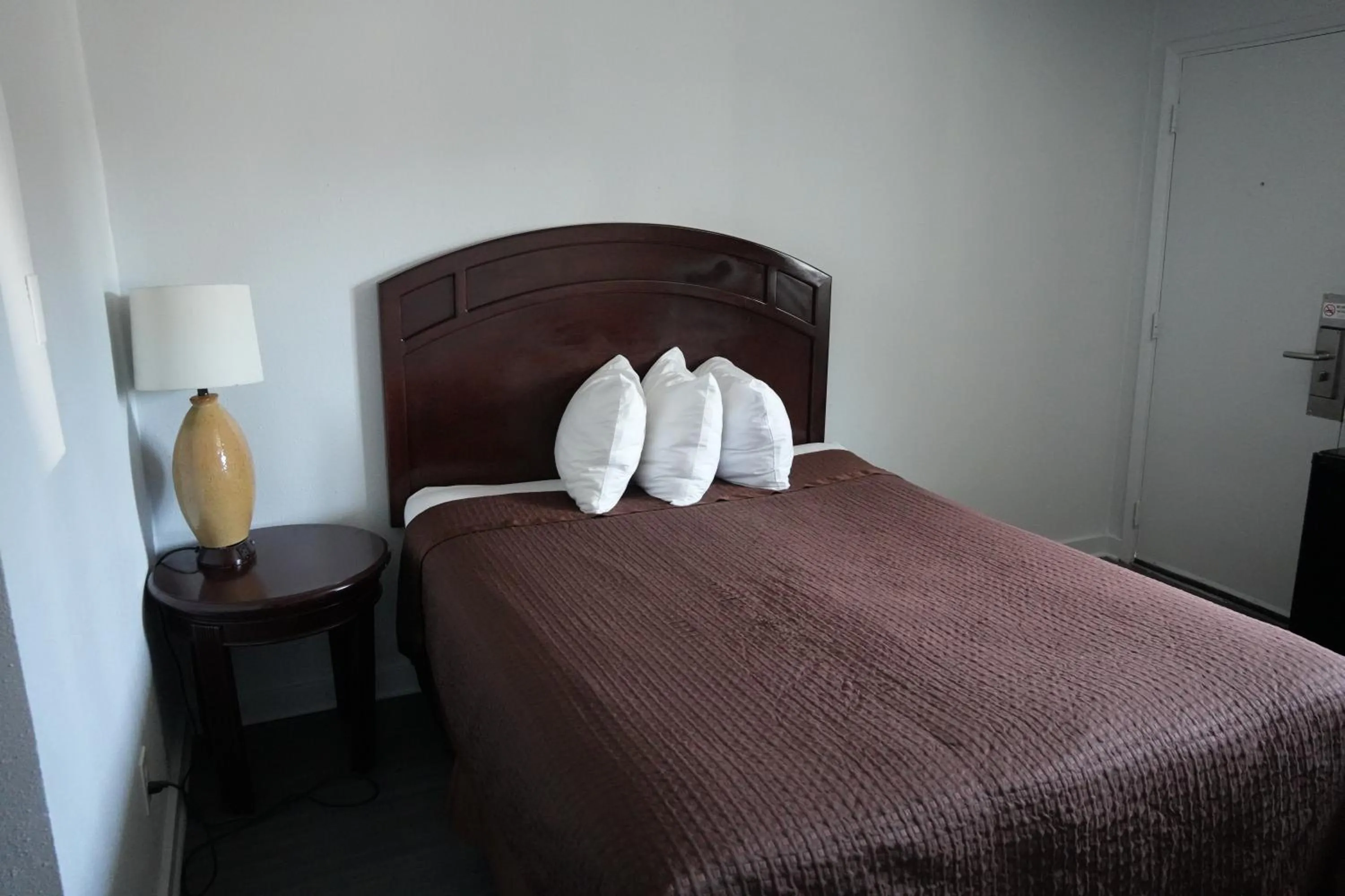 Bed in La Hacienda Motel