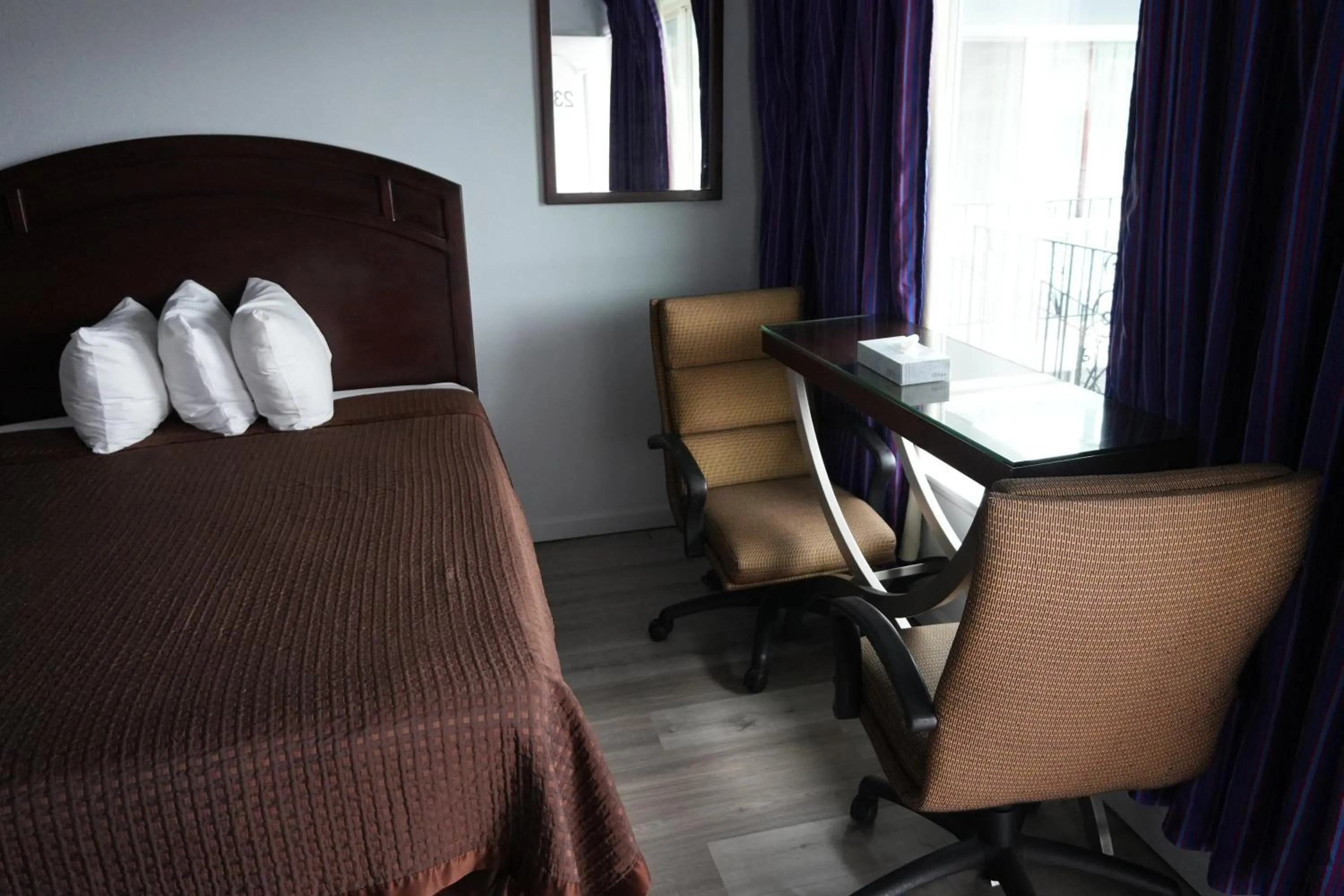 Bed in La Hacienda Motel