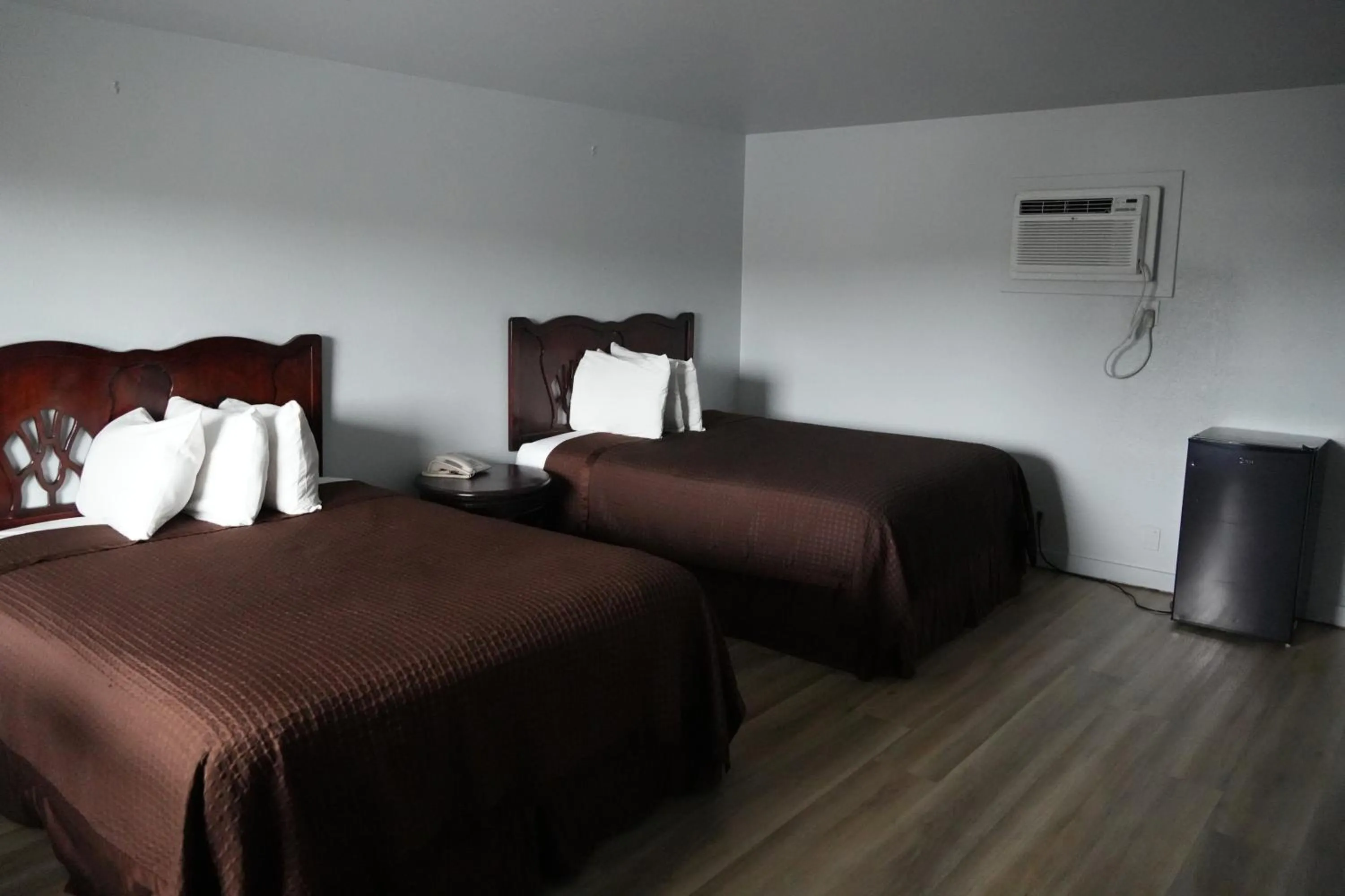 Bed in La Hacienda Motel