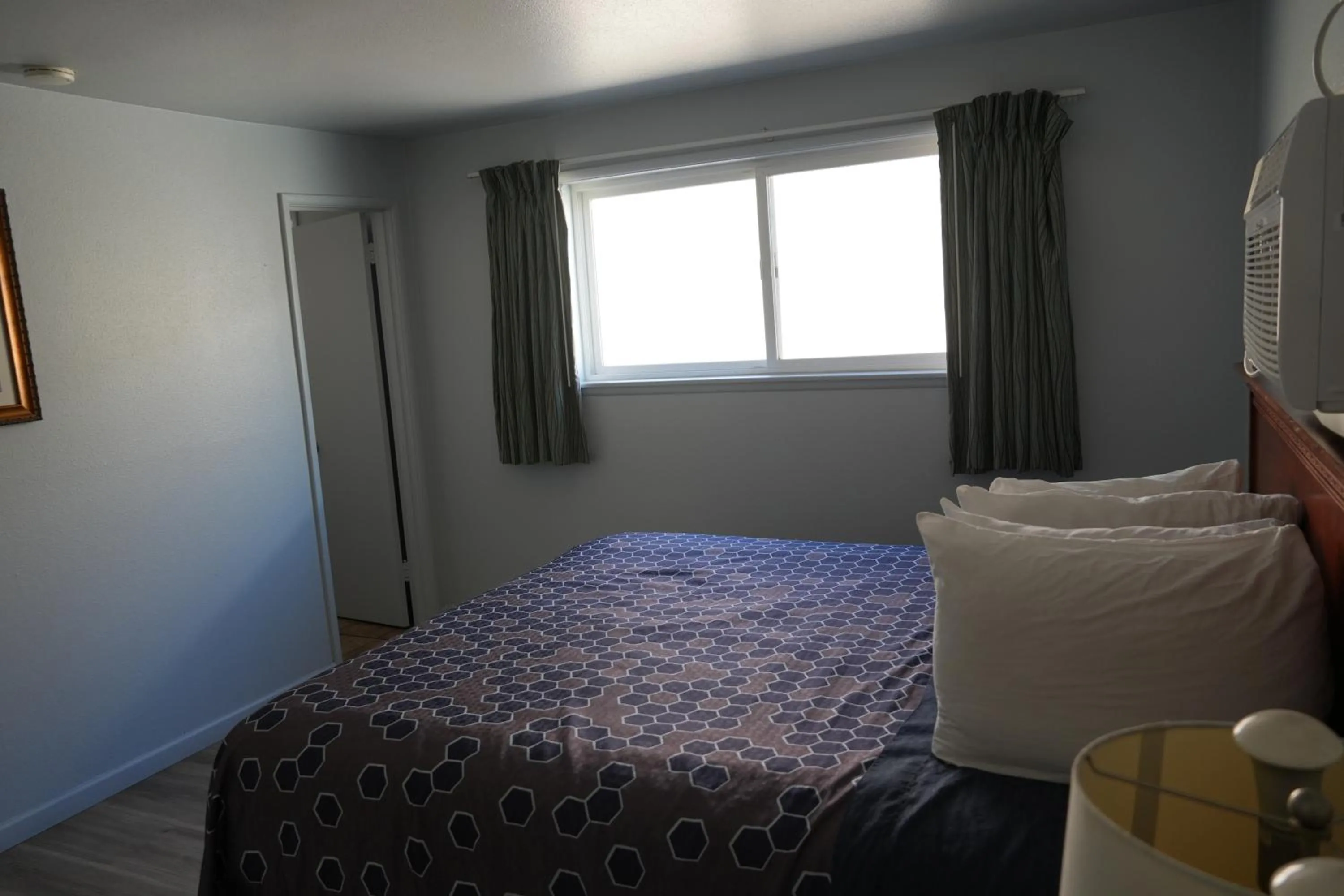 Bed in La Hacienda Motel