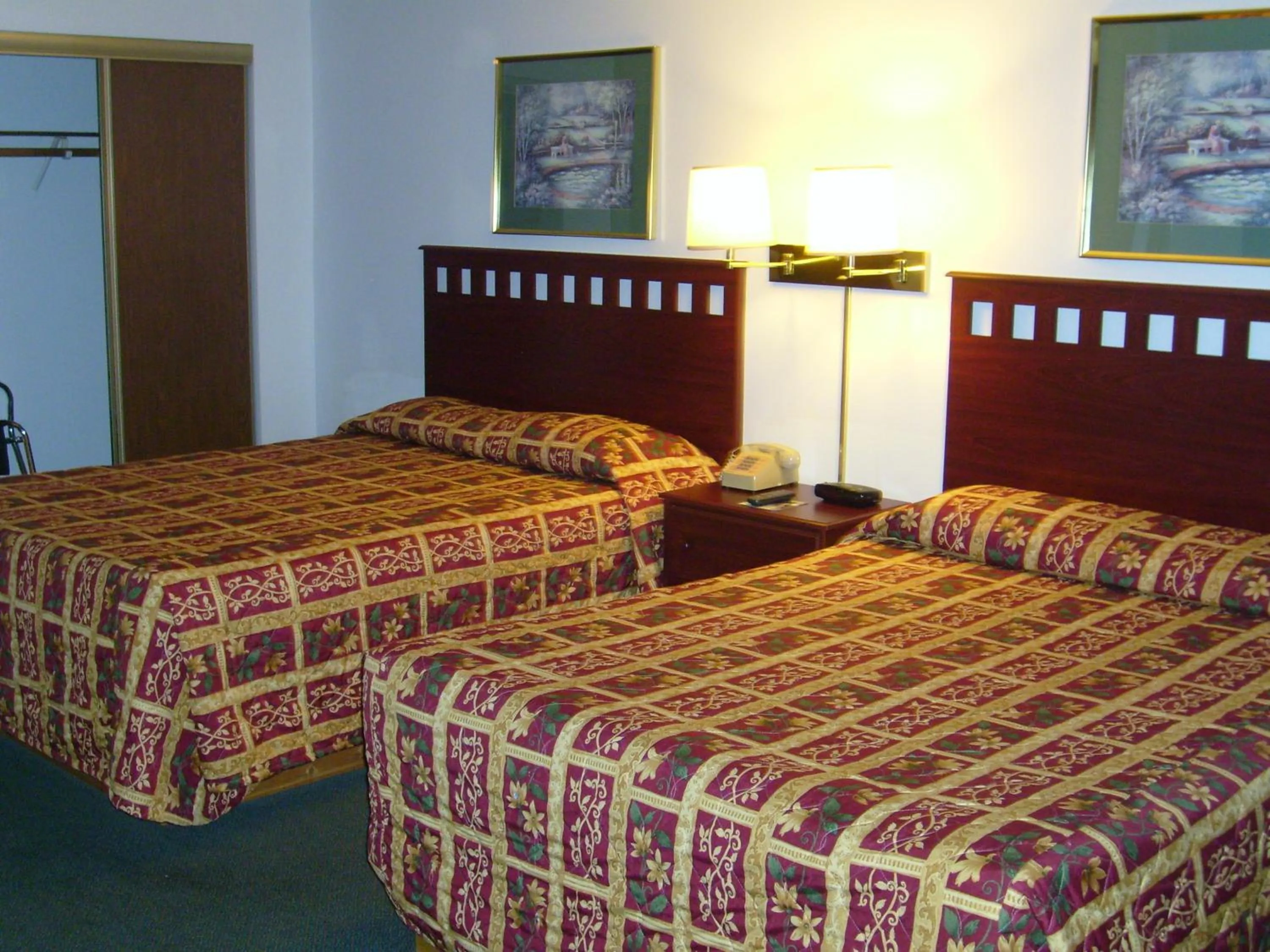 Bed in Shanico Inn