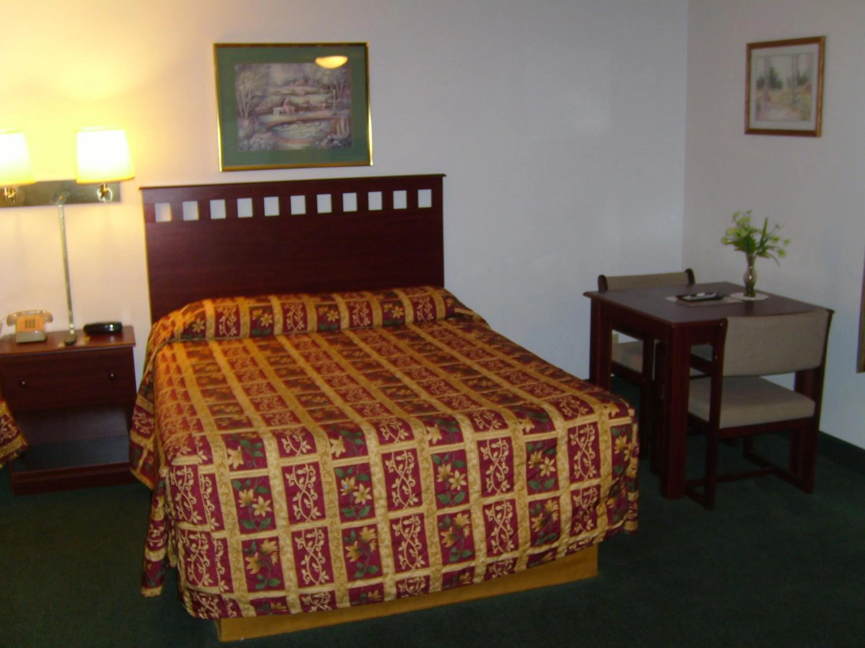 Bed in Shanico Inn