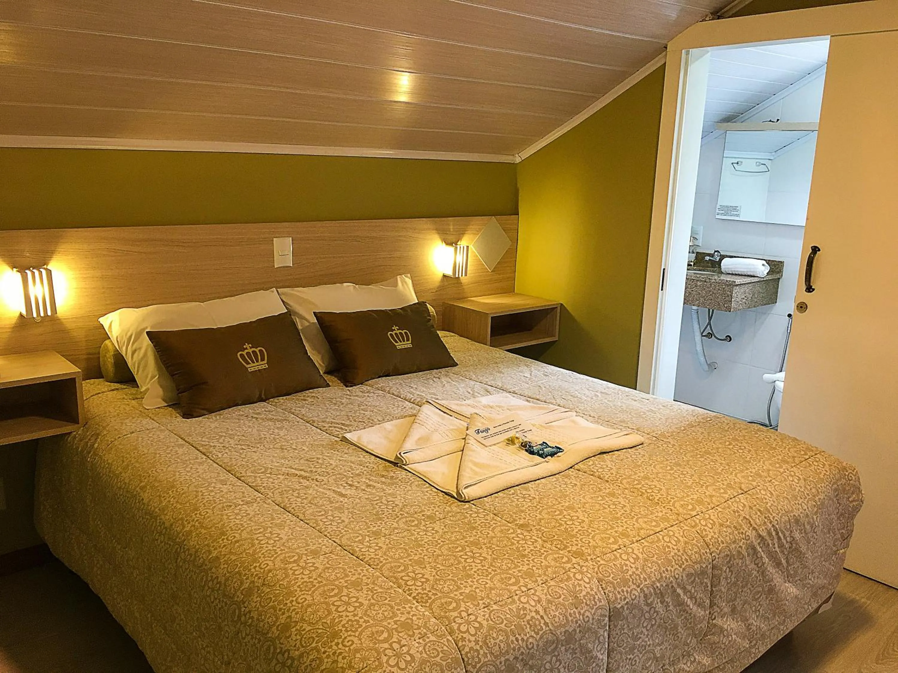 Bed in Pousada Tango