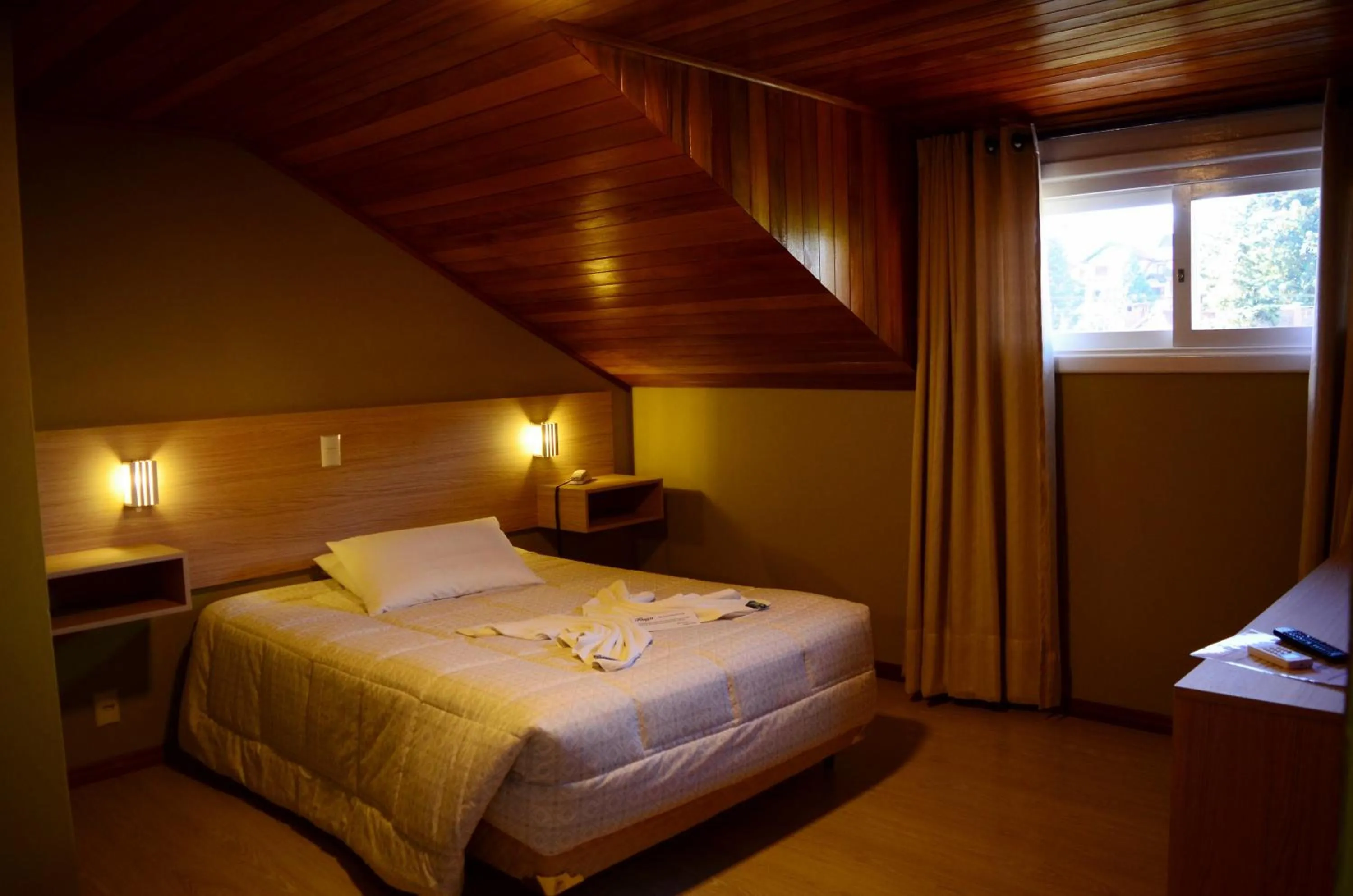 Bed in Pousada Tango